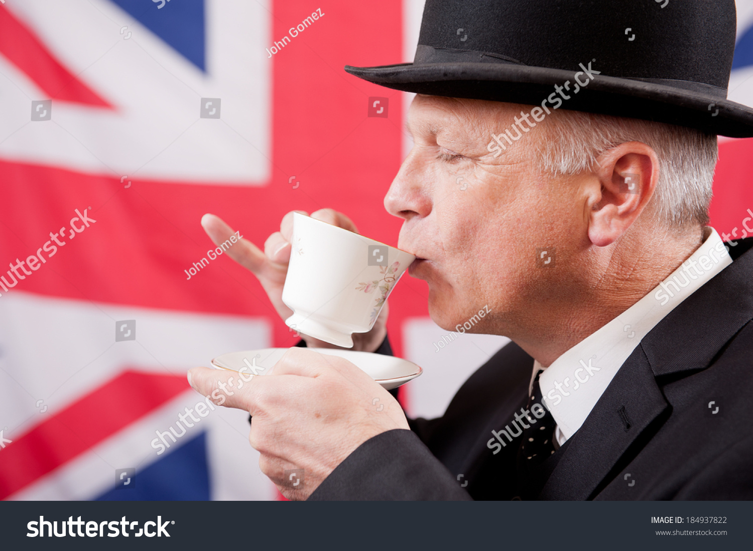 stock-photo-english-gentleman-drinking-tea-184937822.jpg