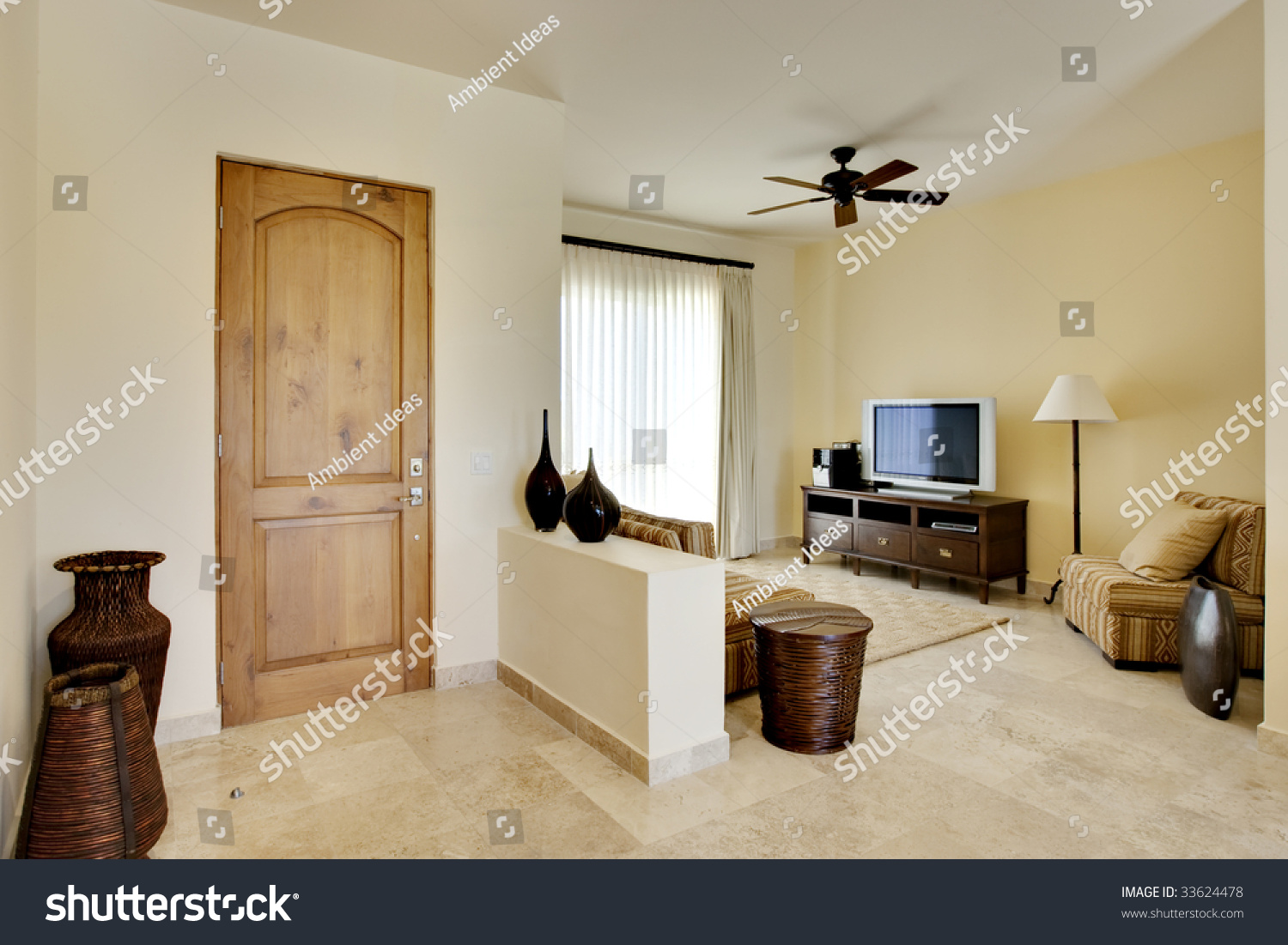 Entrance to luxury home with view of door and foyer stock photo ...