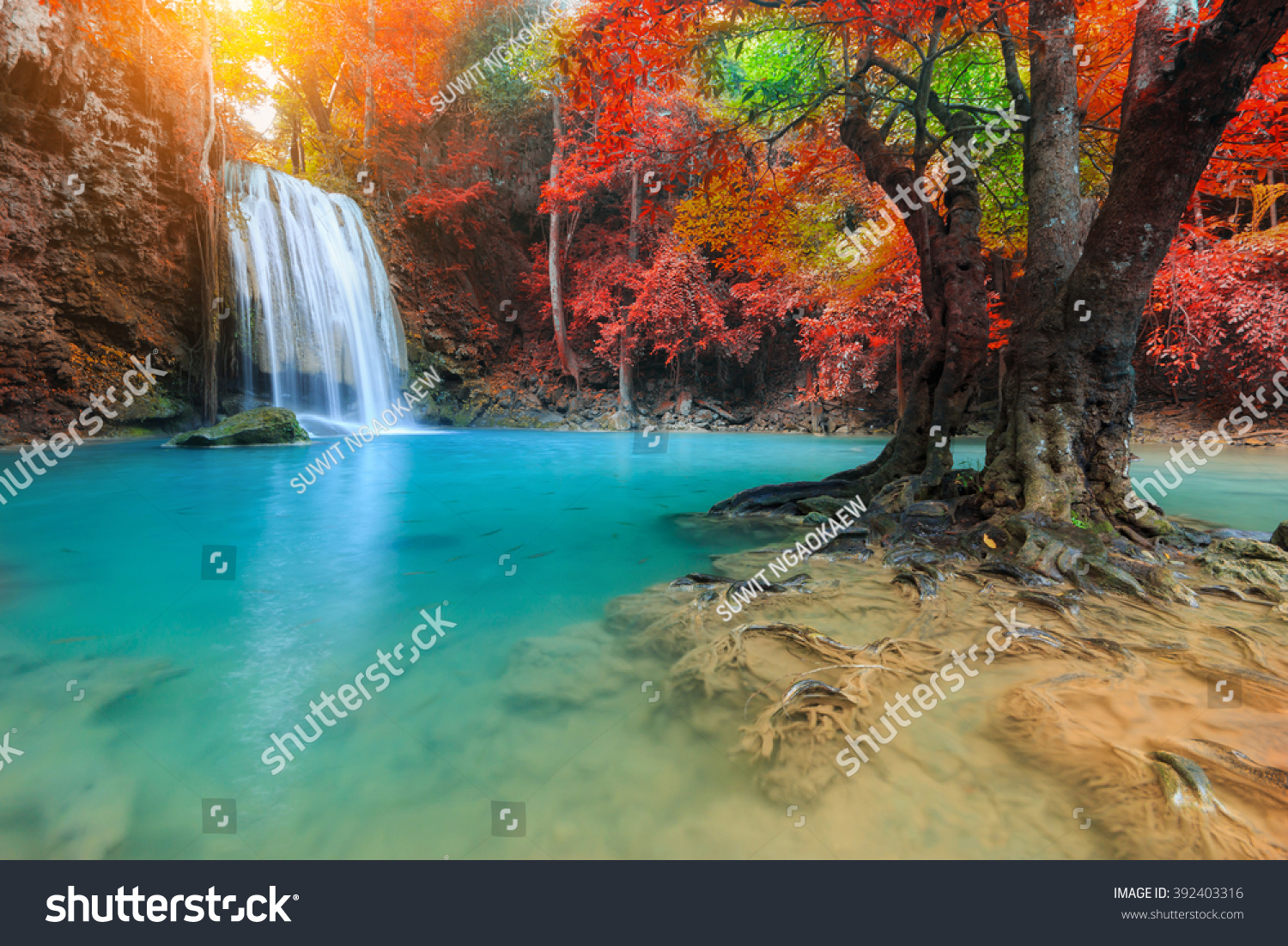 Erawan Waterfall Beautiful Waterfall With Sunlight Rays In Deep Forest