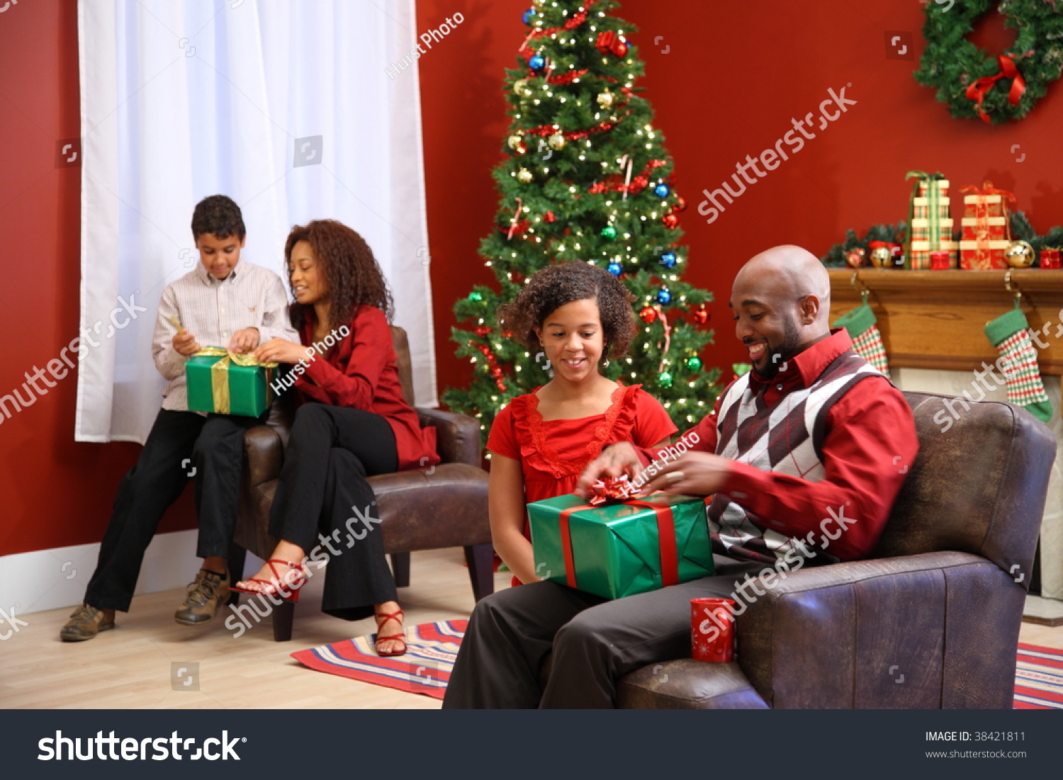 Family Opening Presents On Christmas Morning Stock Photo 38421811