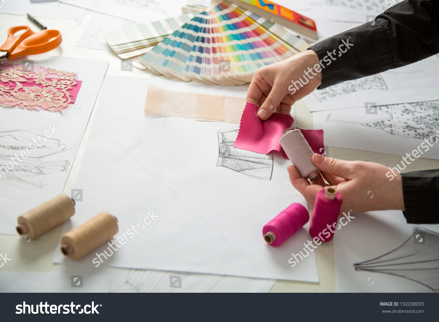 Fashion Designers, Working In Progress On Tailor Table Stock Photo