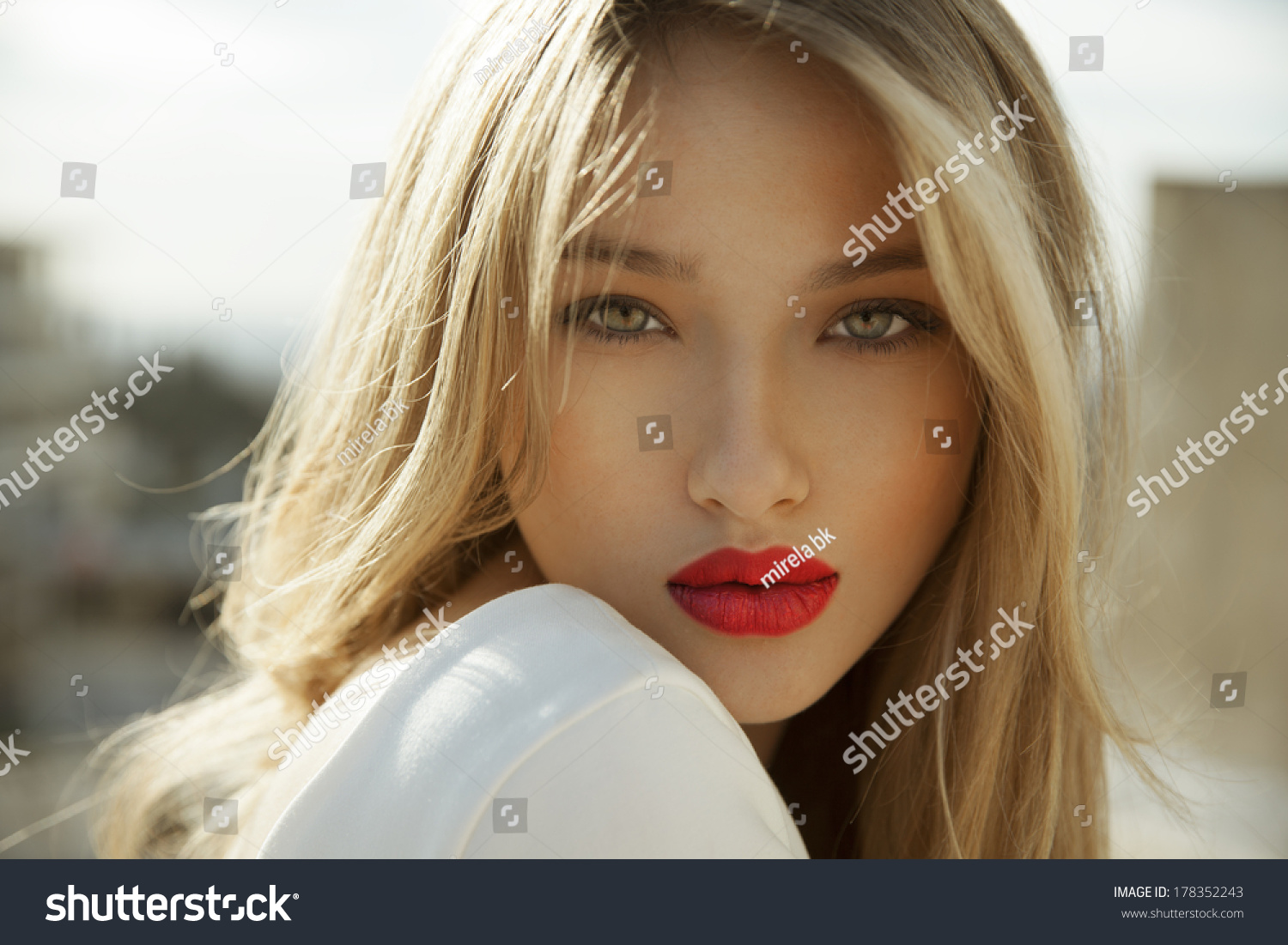 Fashion Photo Of Blonde Beauty With Natural Make Up And Red Lipstick