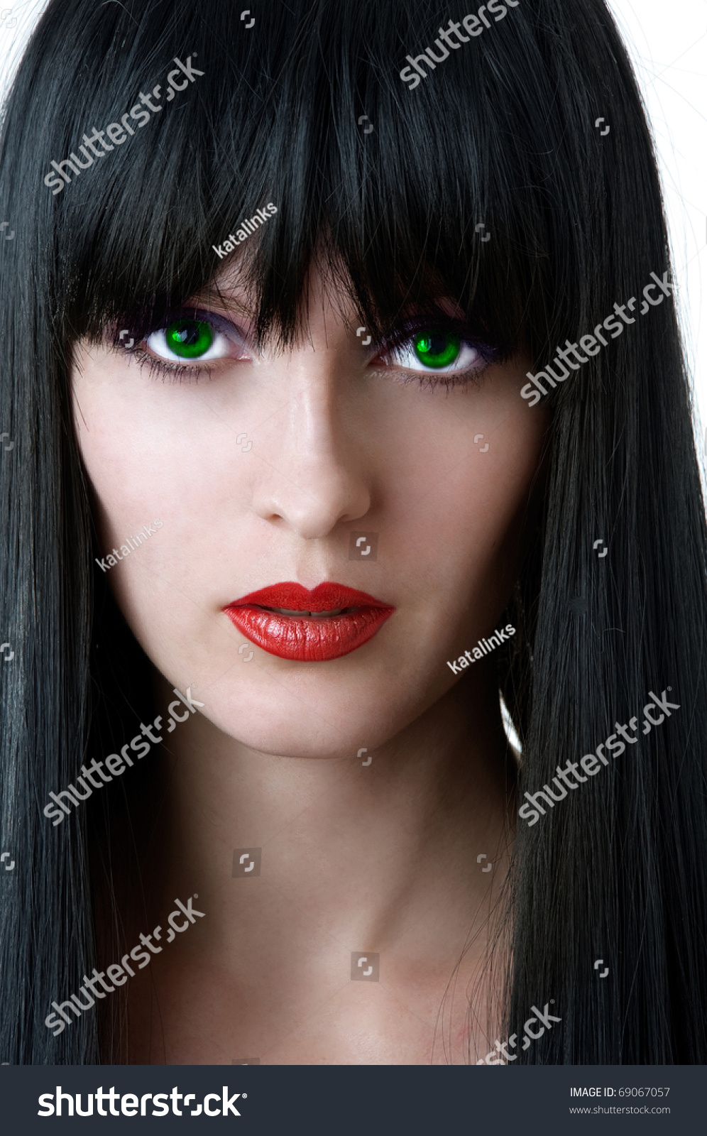 Fashion Portrait Of Glamour Woman With Green Eyes Black Hair And Seductive Red Lips Closeup 