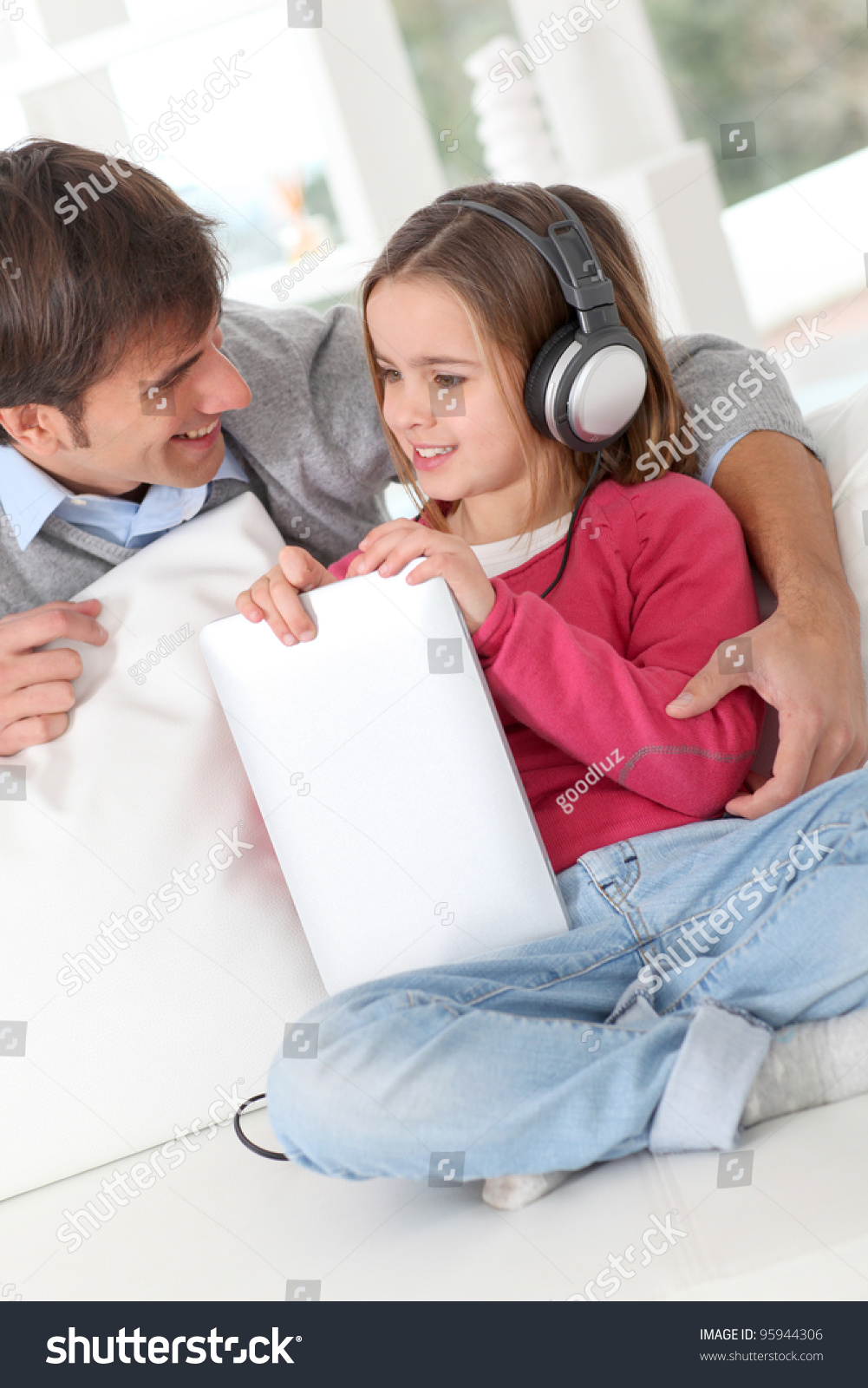 Father And Daughter Listening To Music Stock Photo 95944306 : Shutterstock