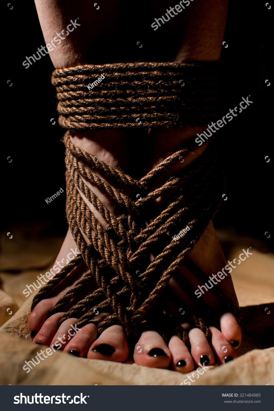 Female Feet Tied With Jute Rope In Japanese Style Of