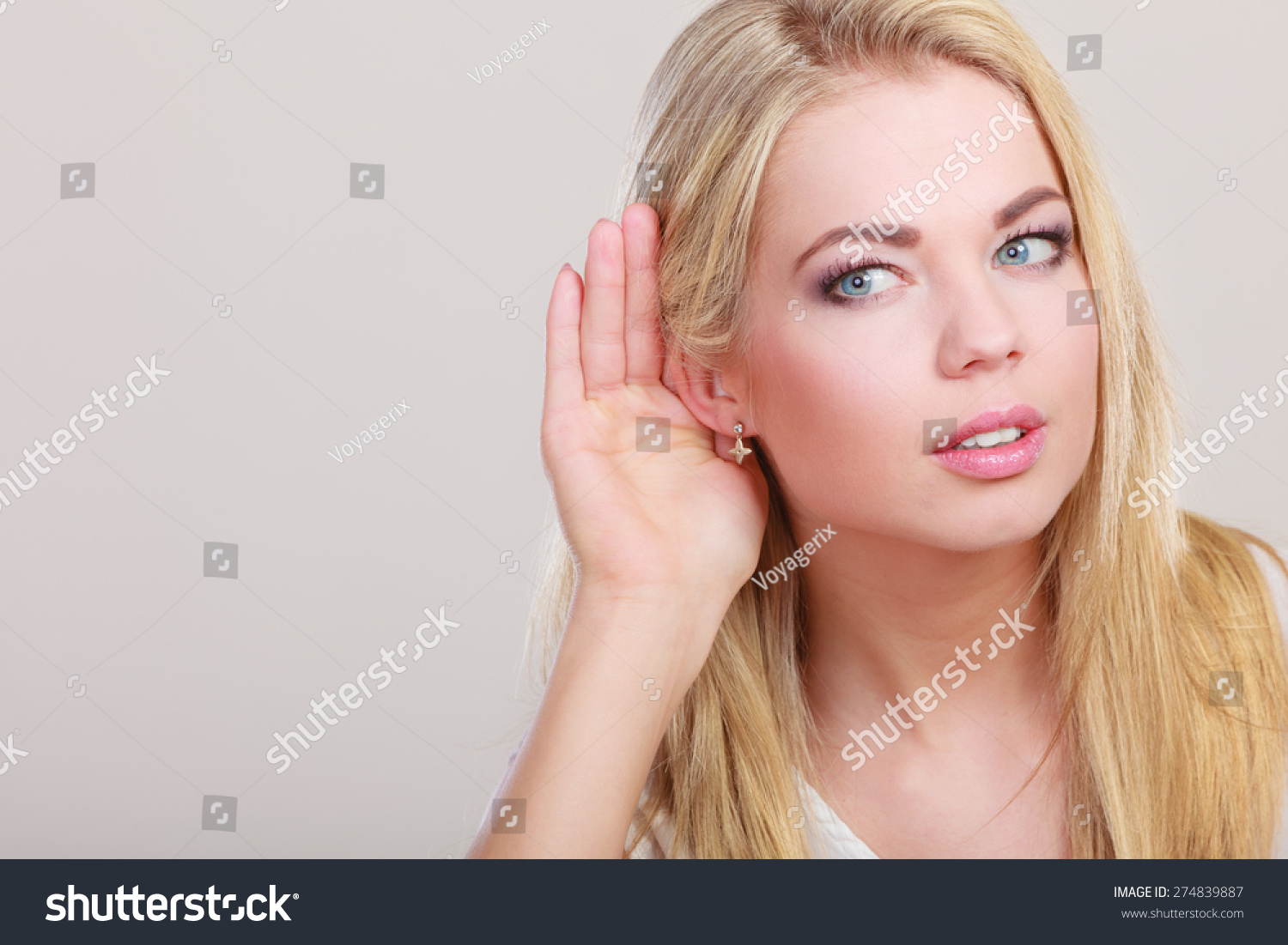 Female Hand To Ear Listening On Gray Gossip Girl With Palm Behind Ear Spying Closeup Young 1381