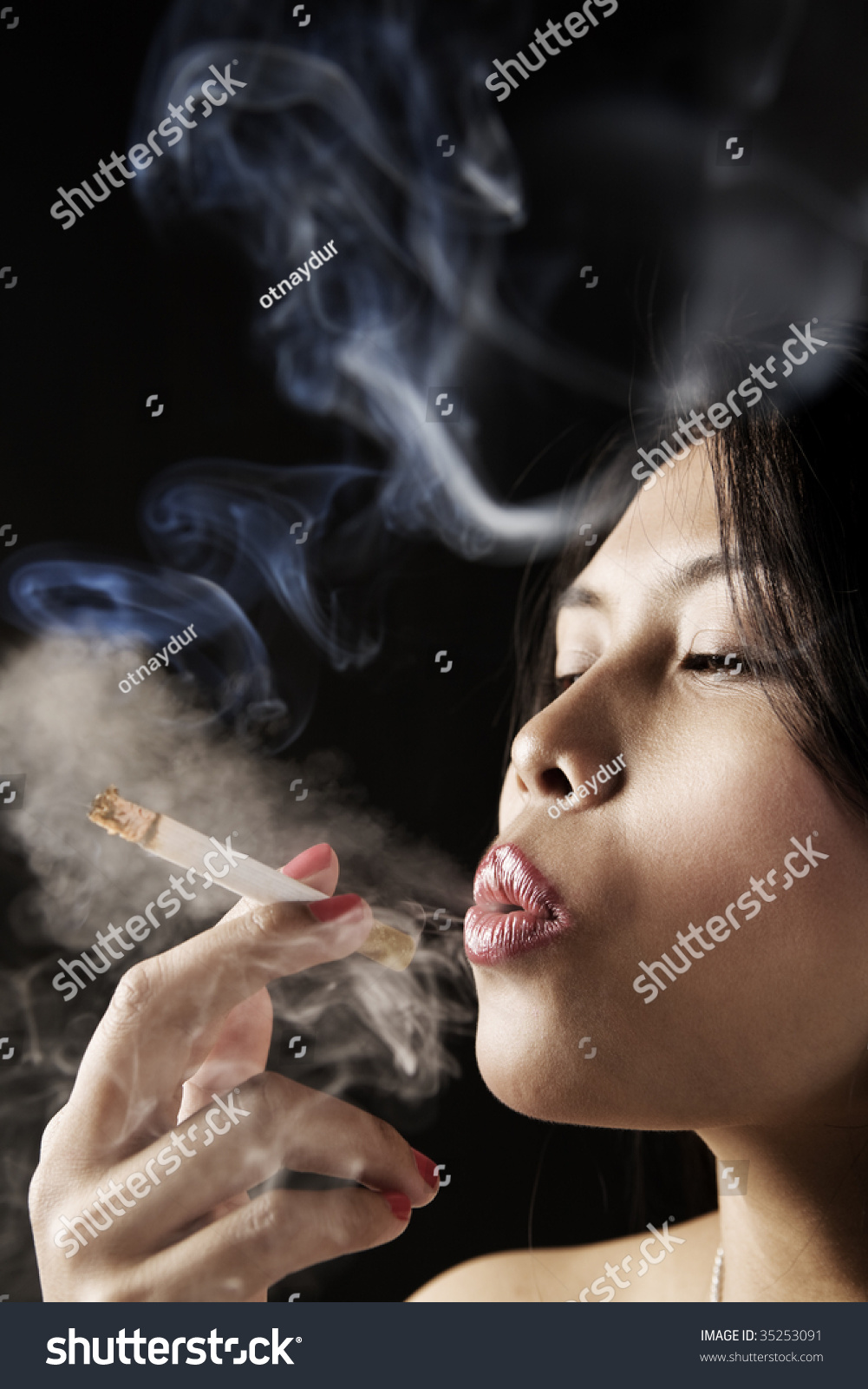 Female Inhale Smoke From Cigarette On Dark Area Stock Photo 35253091