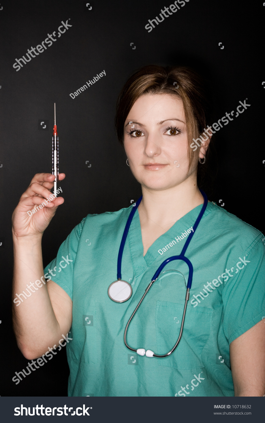 Female Nurse Holding Syringe Stock Photo Shutterstock