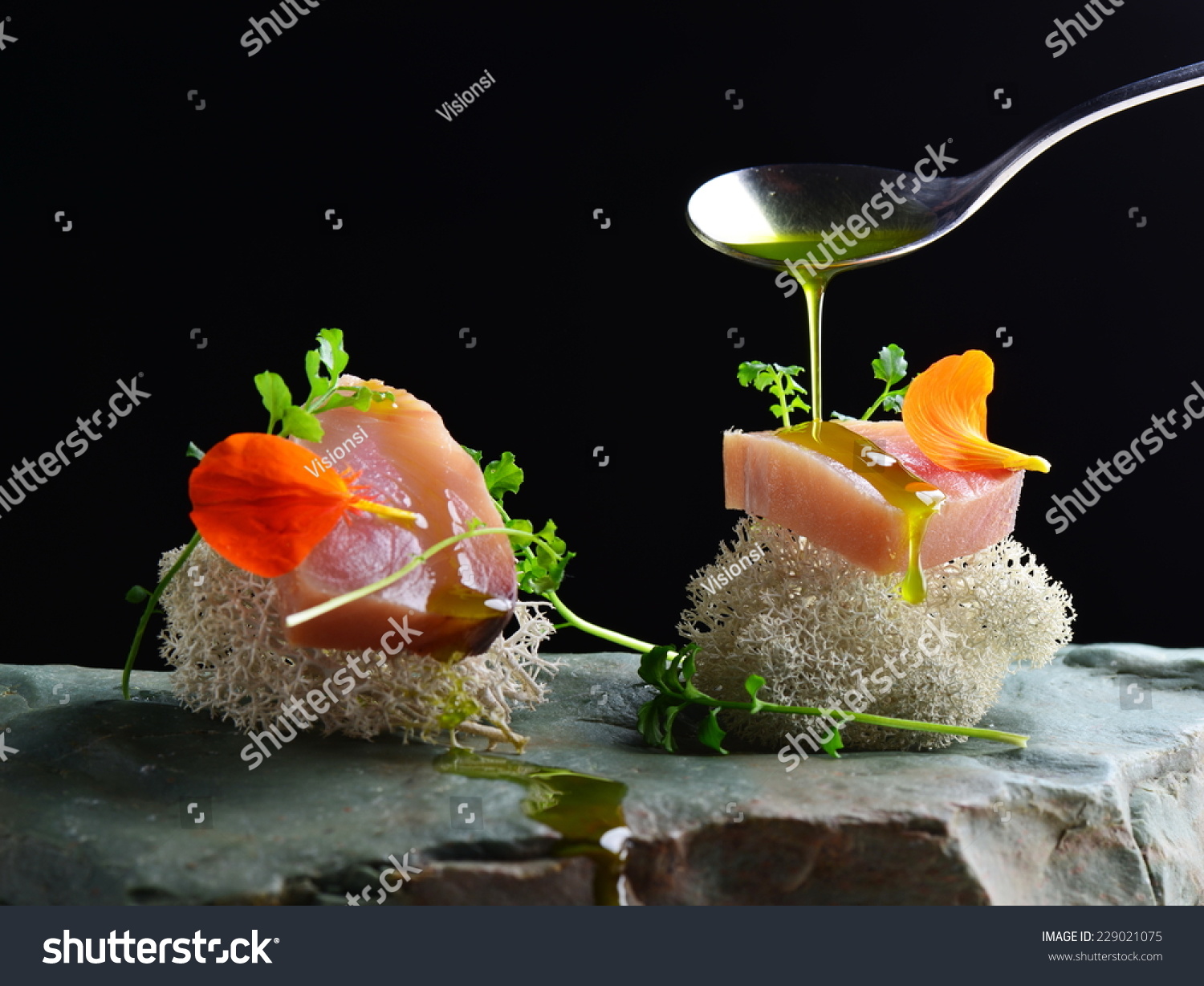 Fine dining, fresh raw ahi tuna sashimi served on sponge with ... Dining