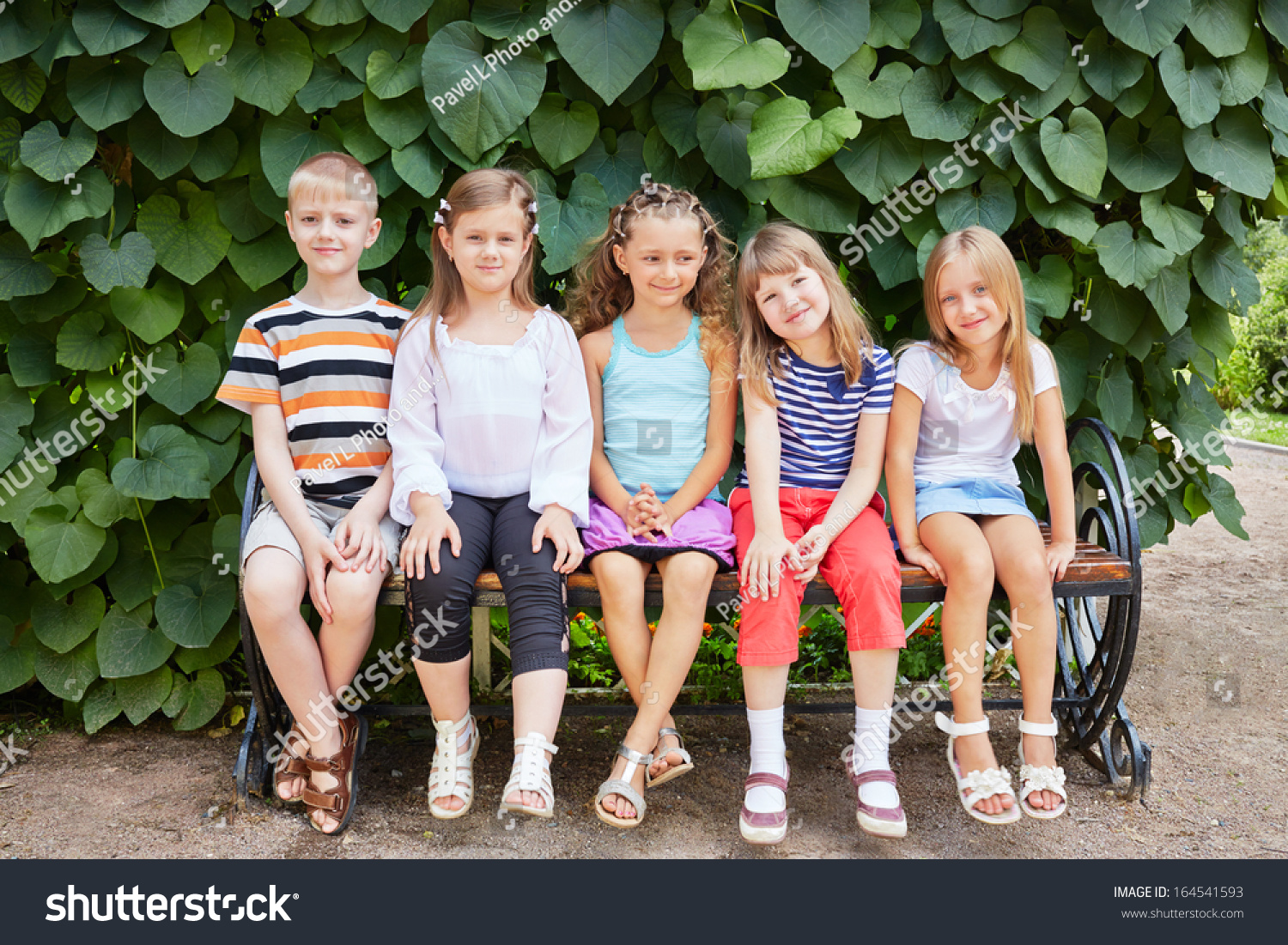 Five Children Friends Sit On Bench In Summer Park Stock Photo 164541593