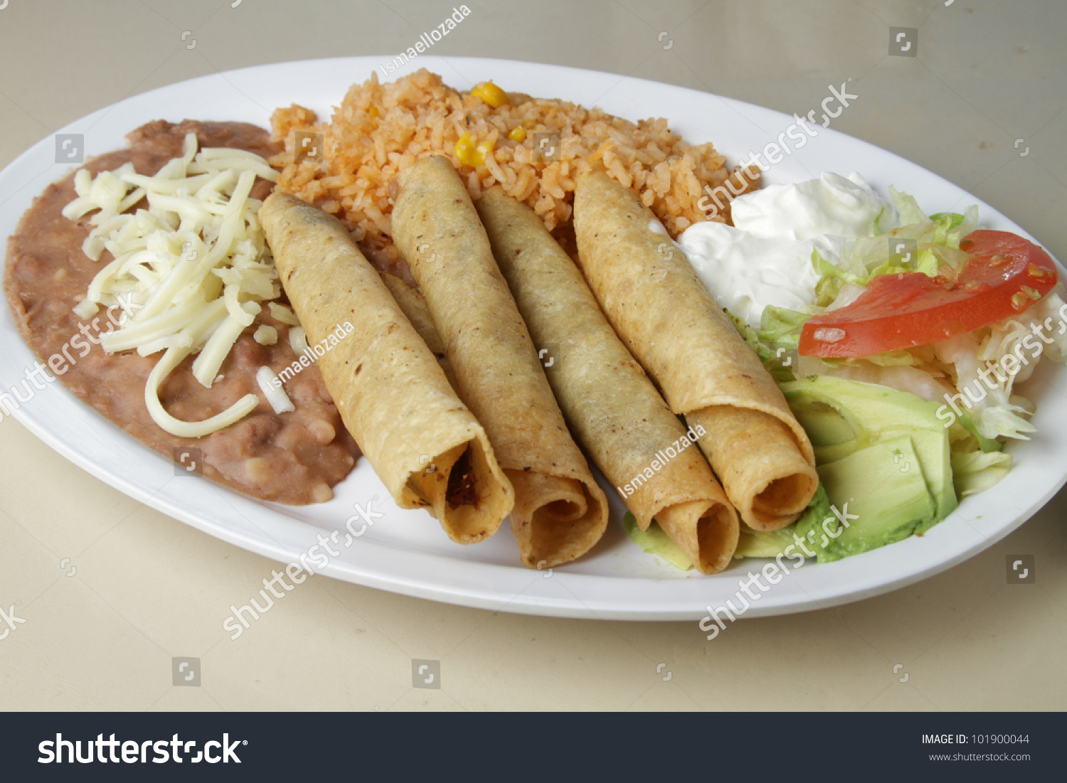 Flautas / Typical Mexican Plate. Rolled Tacos Served As A Meal With A