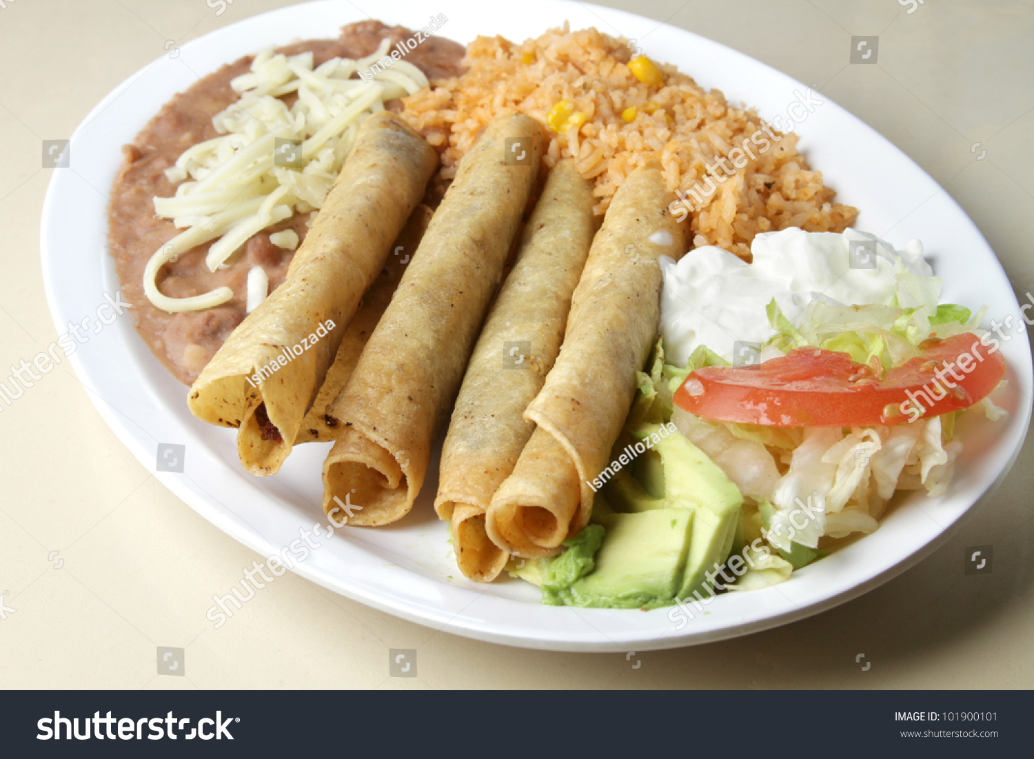Flautas / Typical Mexican Plate. Rolled Tacos Served As A Meal With A