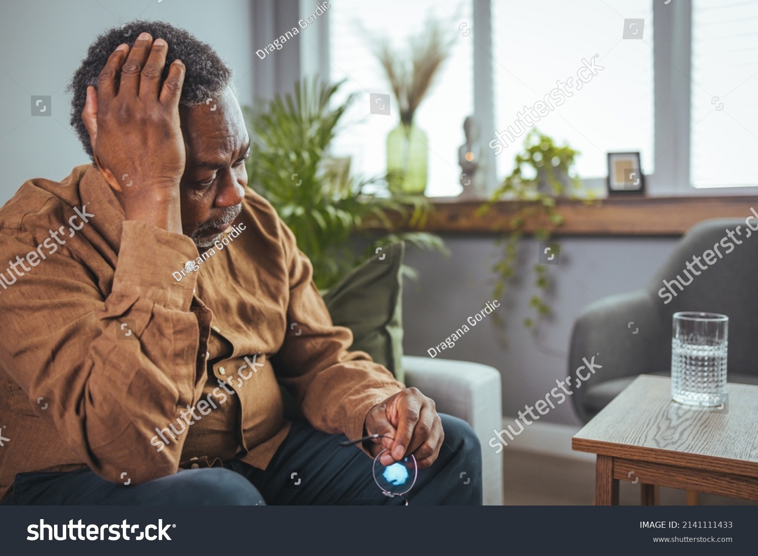 Frustrated Unhealthy Senior Mature Man Touching Stock Photo