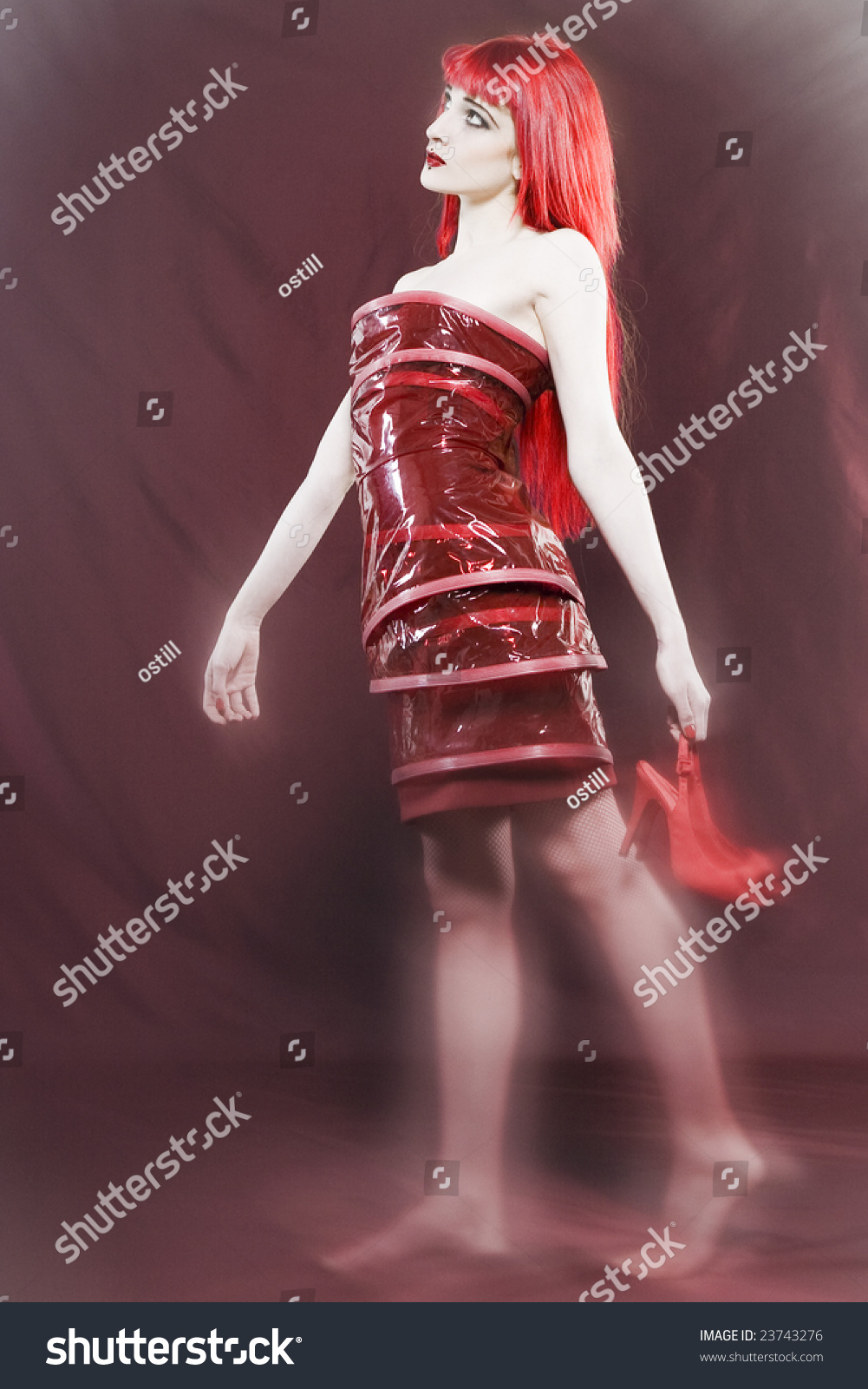 Funny & Sexy Expressive Redhead Girl Wearing A Plastic Coat And Dress ...