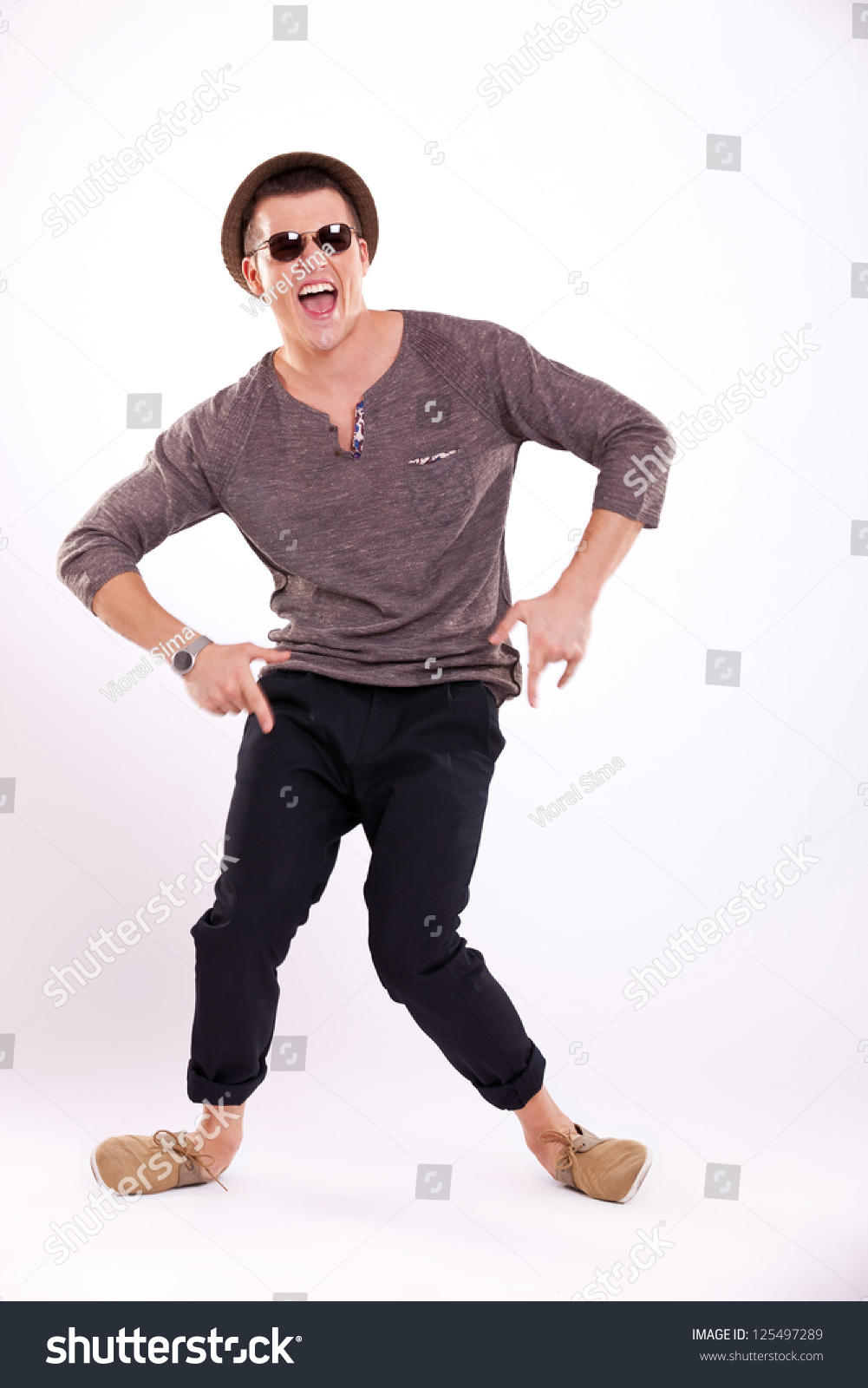 funny-young-casual-man-fooling-around-stock-photo-125497289-shutterstock