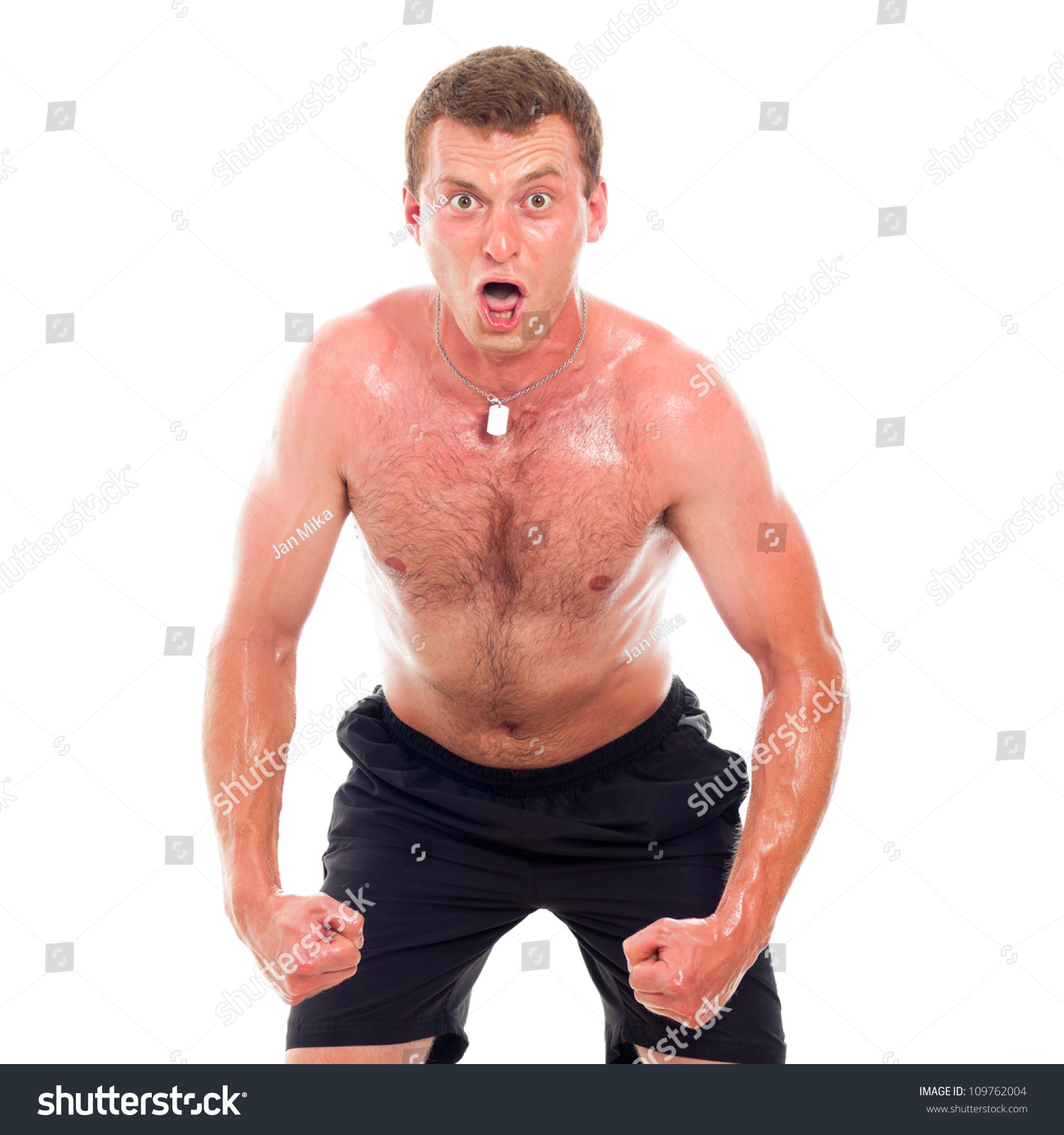 Man With Naked Torso Standing With Dumbbell In Hand Stock 