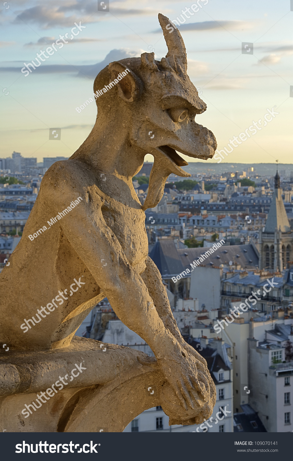 Gargoyle Statue On The Top Of Notre Dame Cathedral In Paris Stock