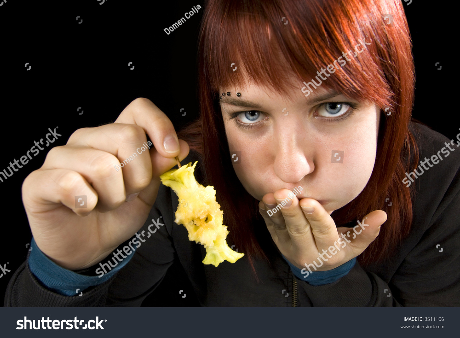 girl-almost-throwing-after-eating-apple-stock-photo-8511106-shutterstock