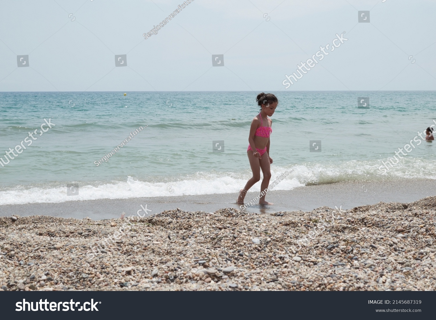 Girl Pink Bikini Playing Happily On Stock Photo Shutterstock