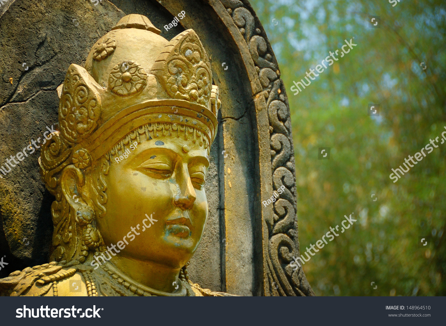 Save to a lightbox - stock-photo-gold-female-figure-statue-taken-at-ken-dedes-monument-malang-east-java-indonesia-148964510