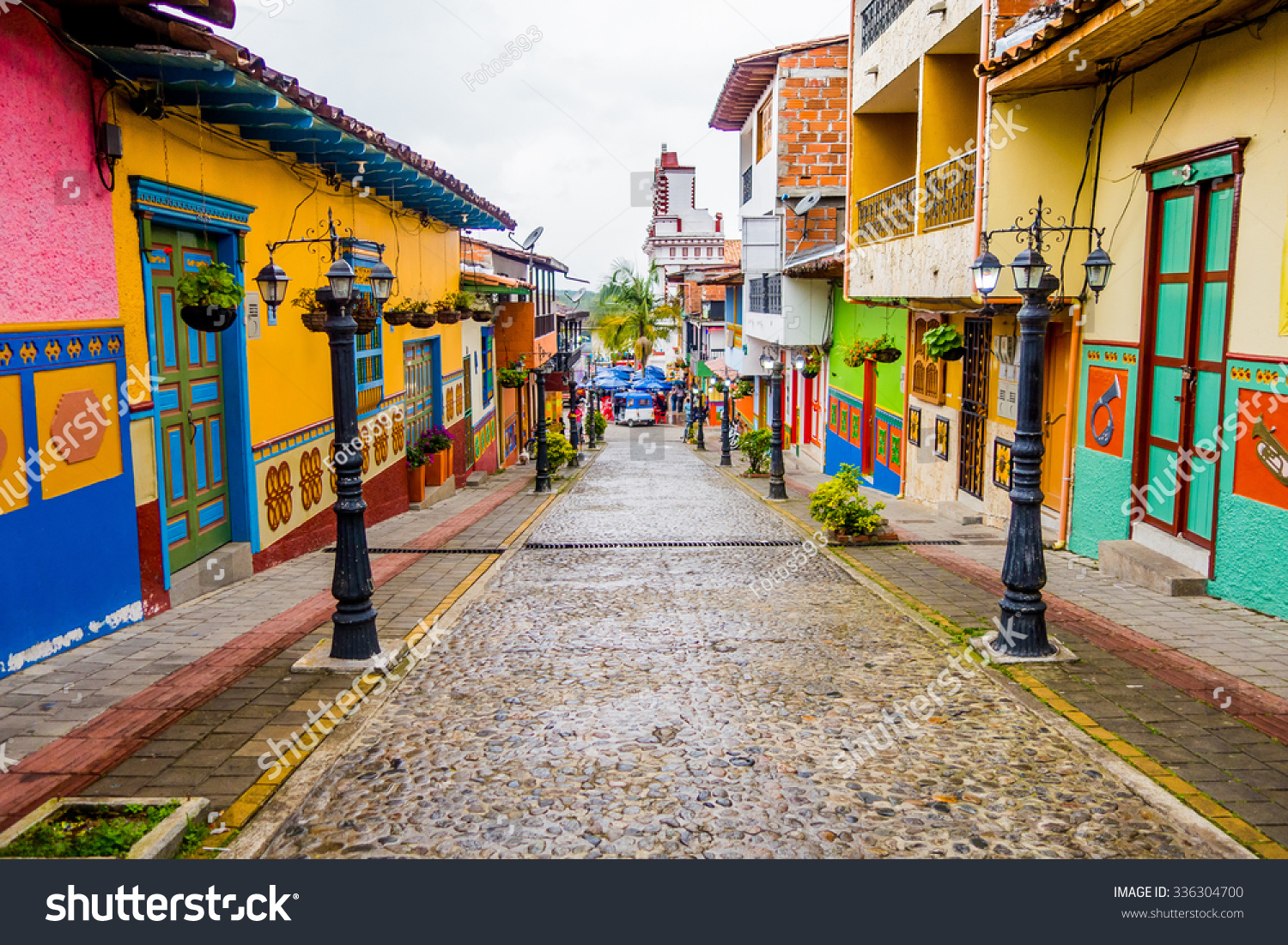 http://image.shutterstock.com/z/stock-photo-guatape-colombia-february-beautiful-and-colorful-streets-in-guatape-city-center-known-336304700.jpg