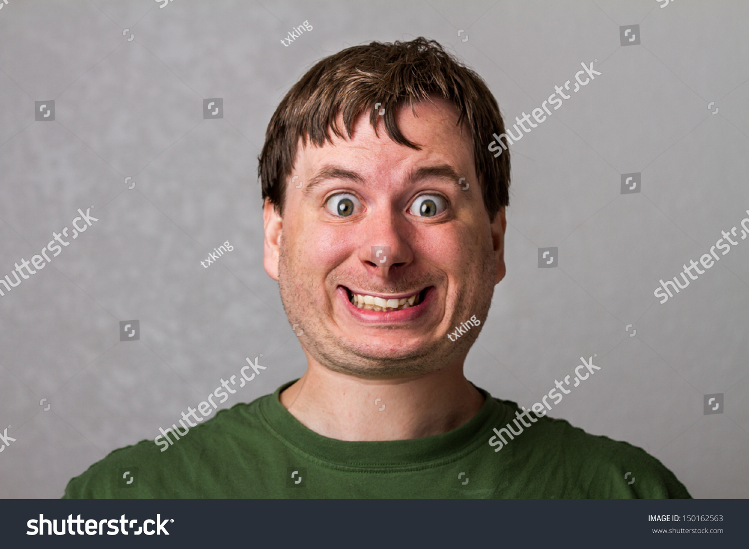 guy-making-a-creepy-smile-with-a-nice-distorted-head-stock-photo