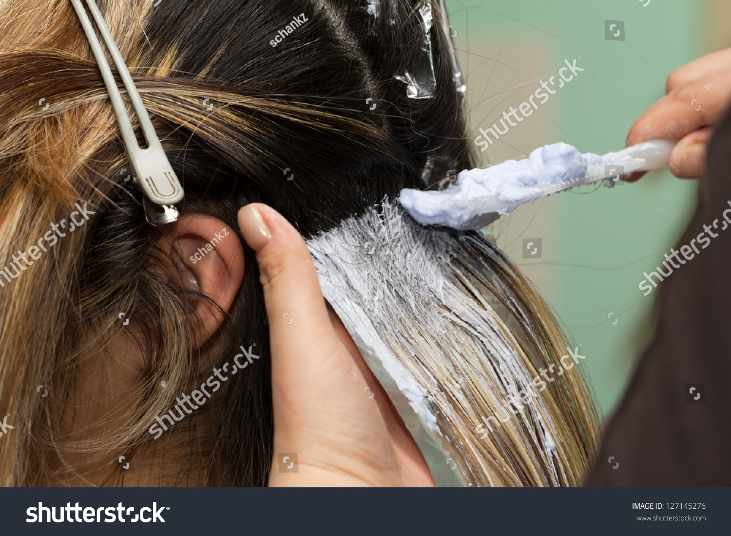 http://image.shutterstock.com/z/stock-photo-hair-colouring-in-process-127145276.jpg