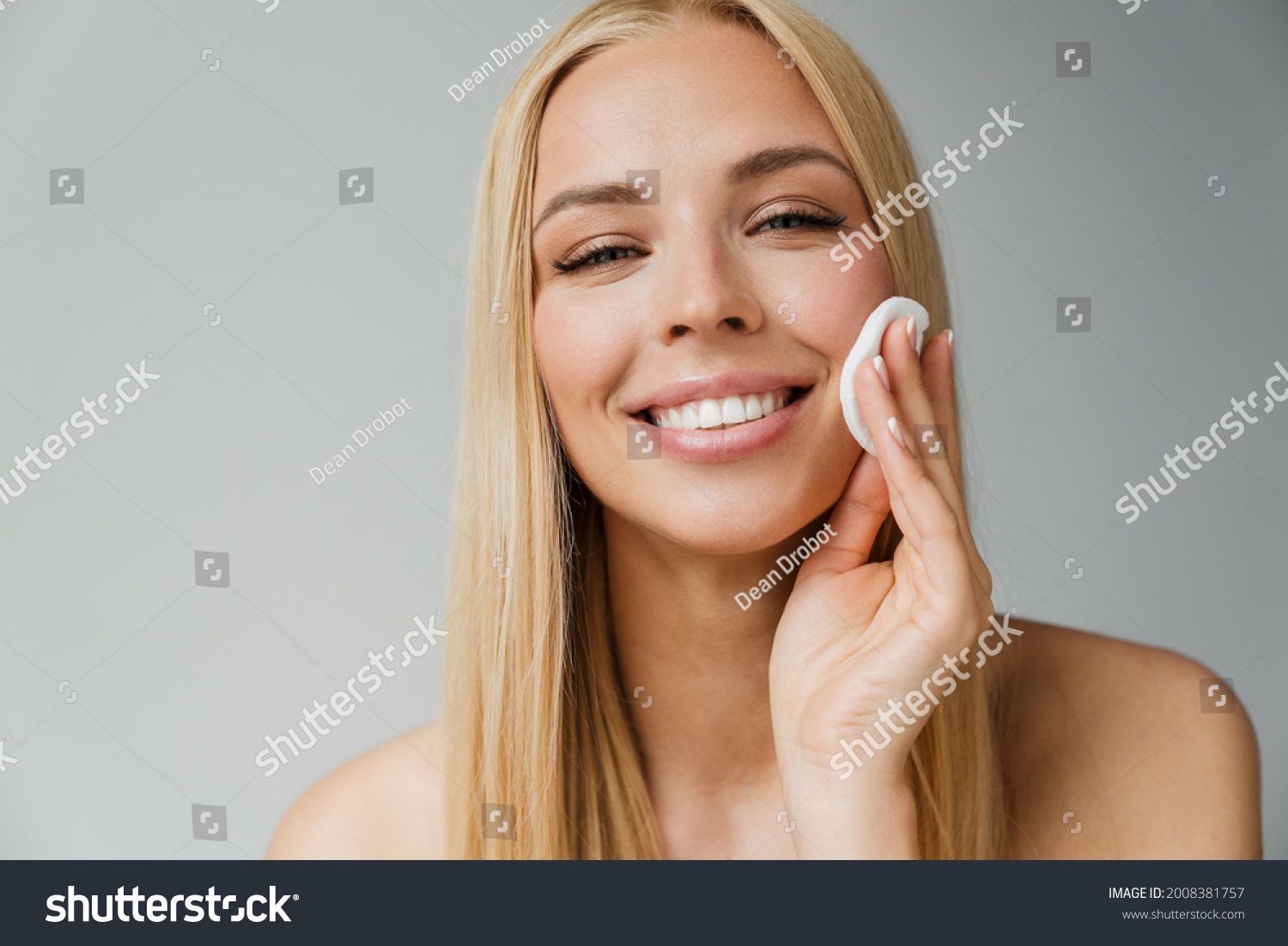 Halfnaked Blonde Woman Laughing While Using Stock Photo