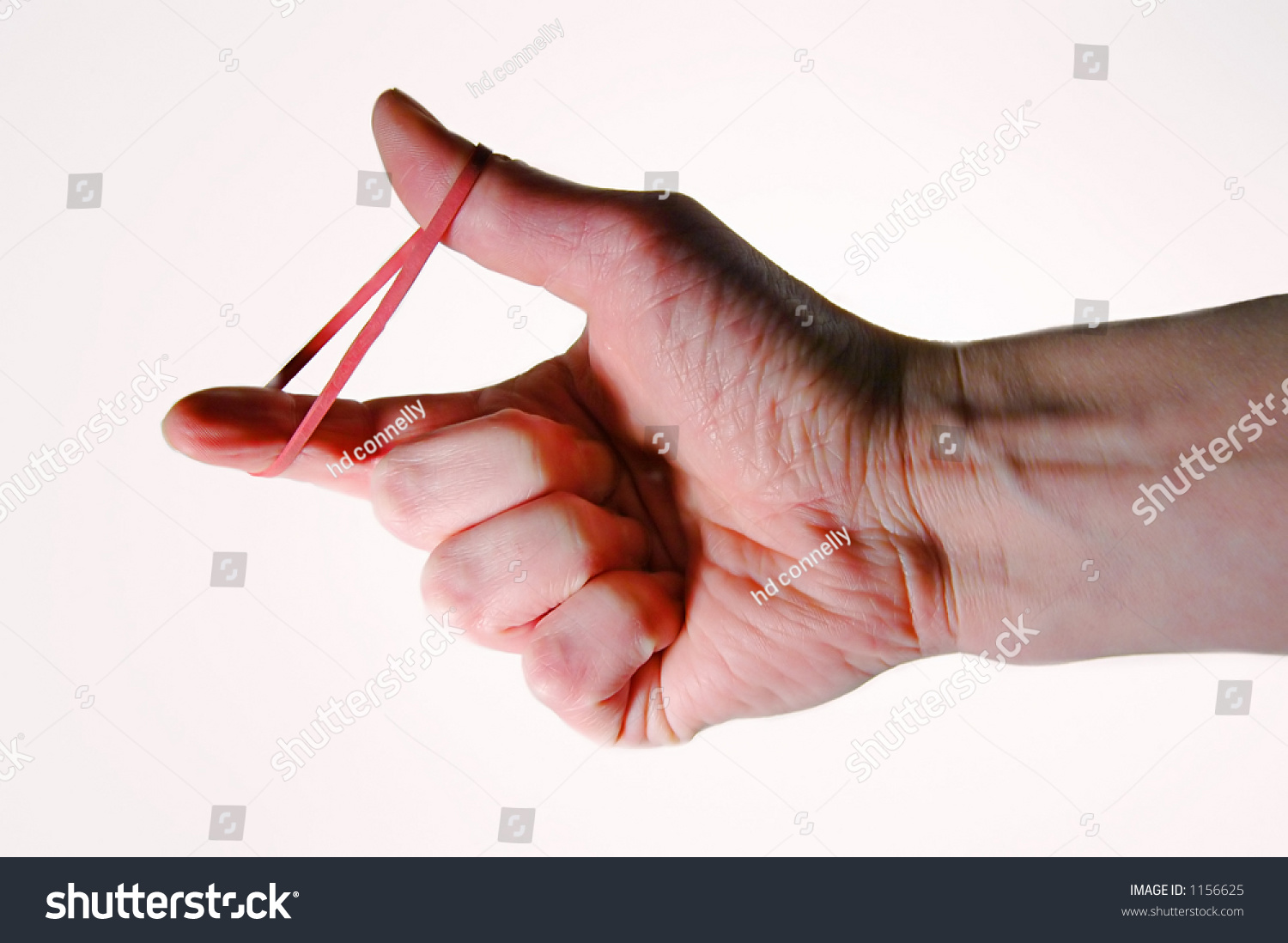 Hand Stretched Rubber Band Stock Photo 1156625 Shutterstock