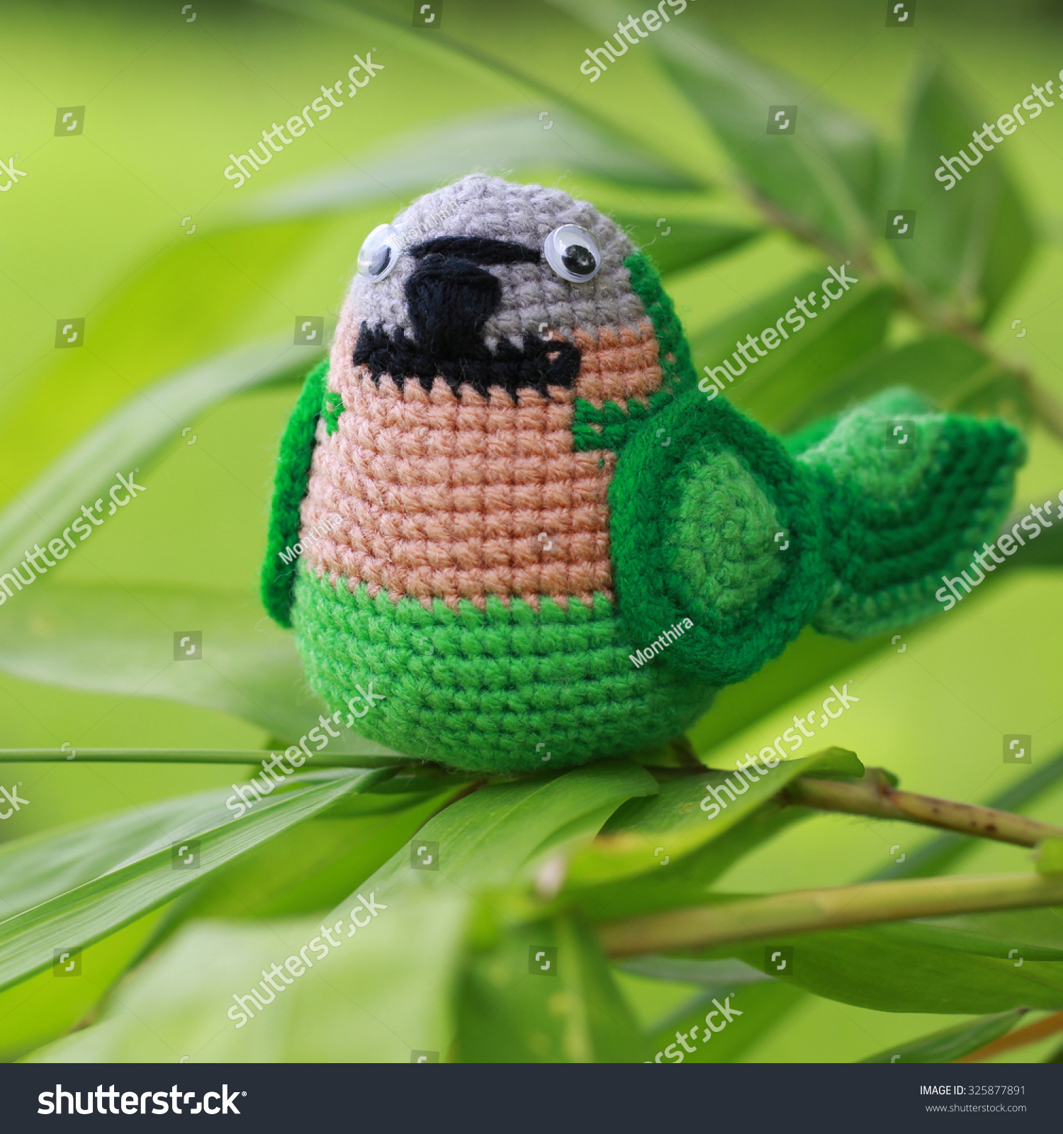 green parrot doll