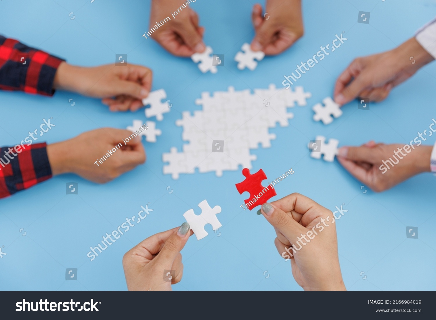 Hands Diverse People Assembling Jigsaw Puzzle Stock Photo