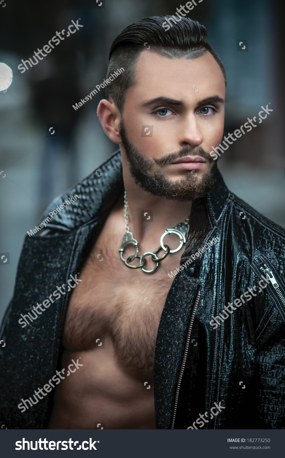 Handsome Beard Man Posing In Leather Raincoat Leather Pants And