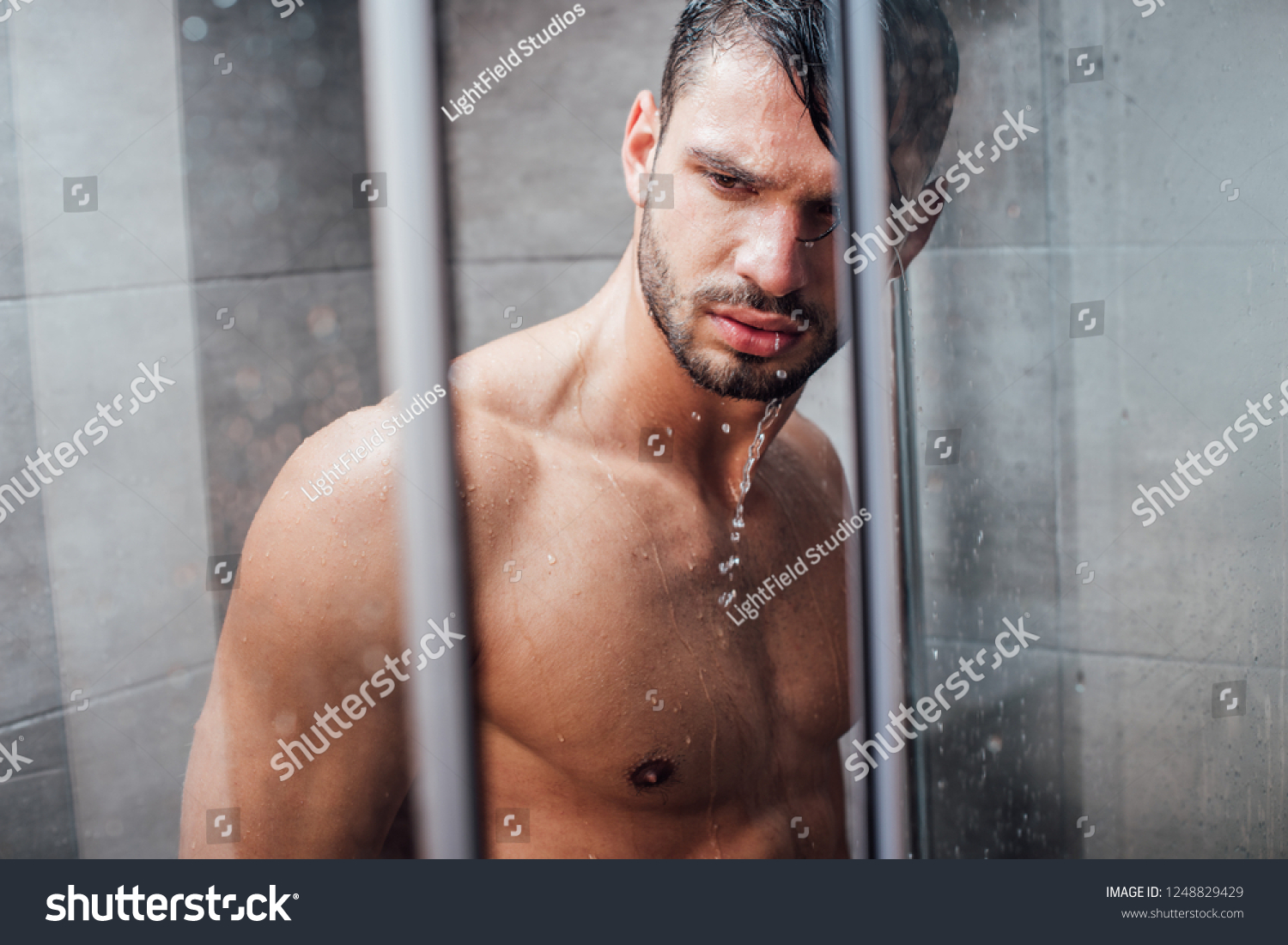 Handsome Naked Muscular Man Taking Shower Stockfotó 1248829429