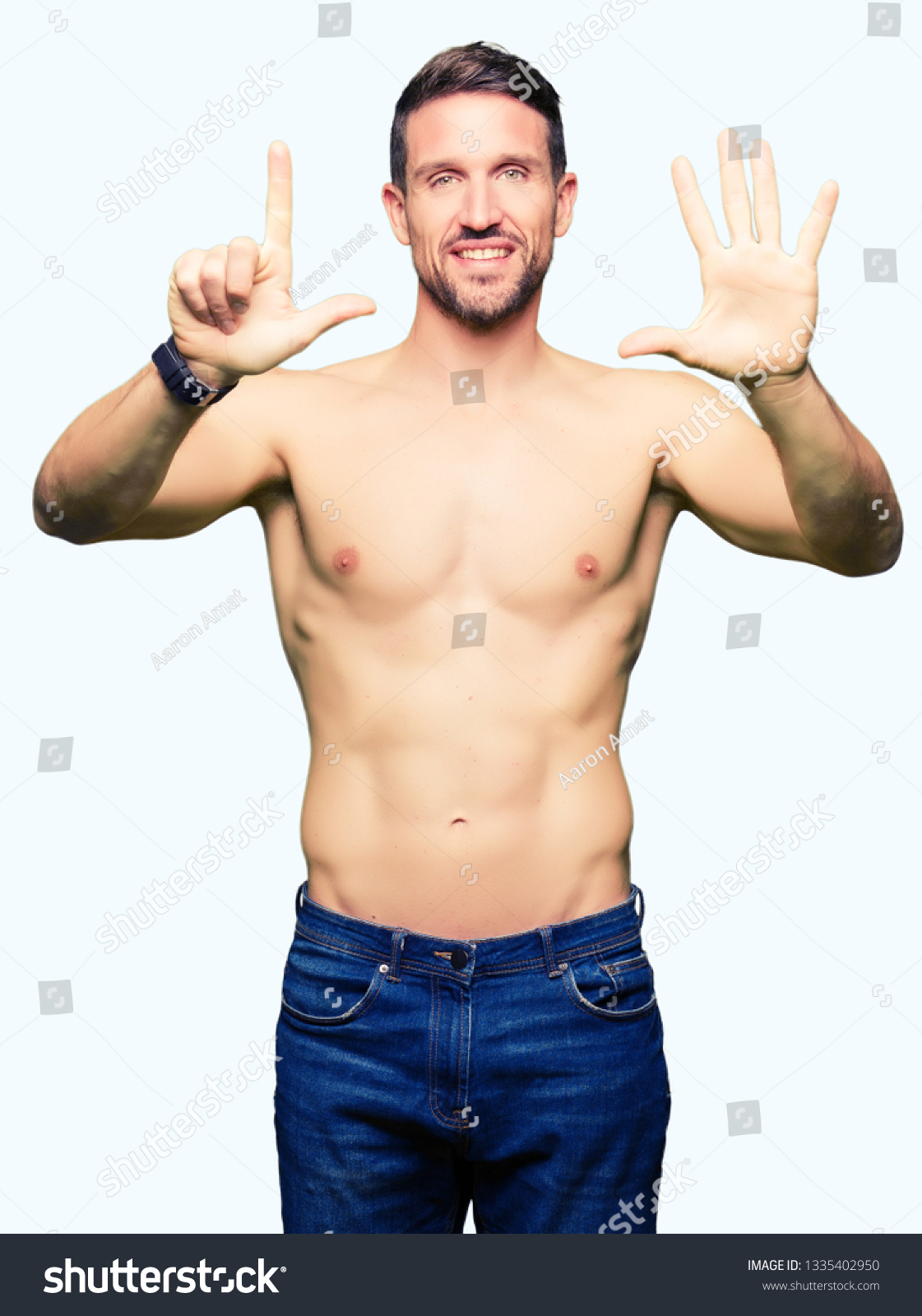 Handsome Shirtless Man Showing Nude Chest Stock Photo 1335402950