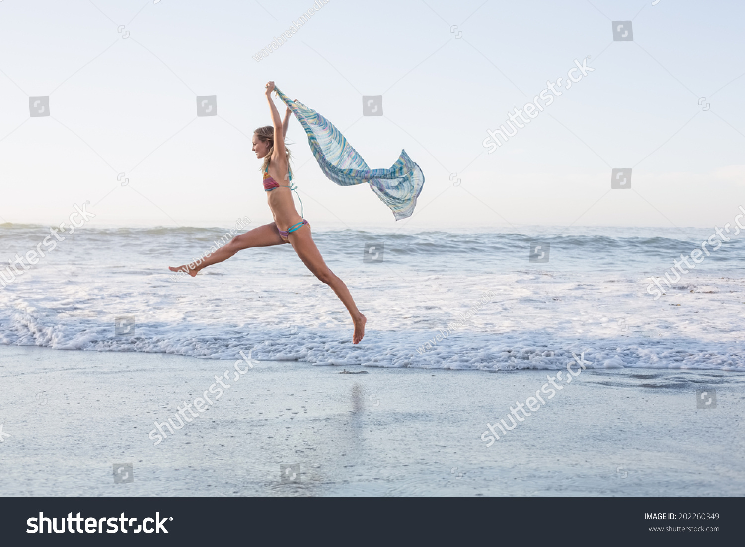 Happy Blonde Leaping On Beach Bikini Stock Photo 202260349 Shutterstock