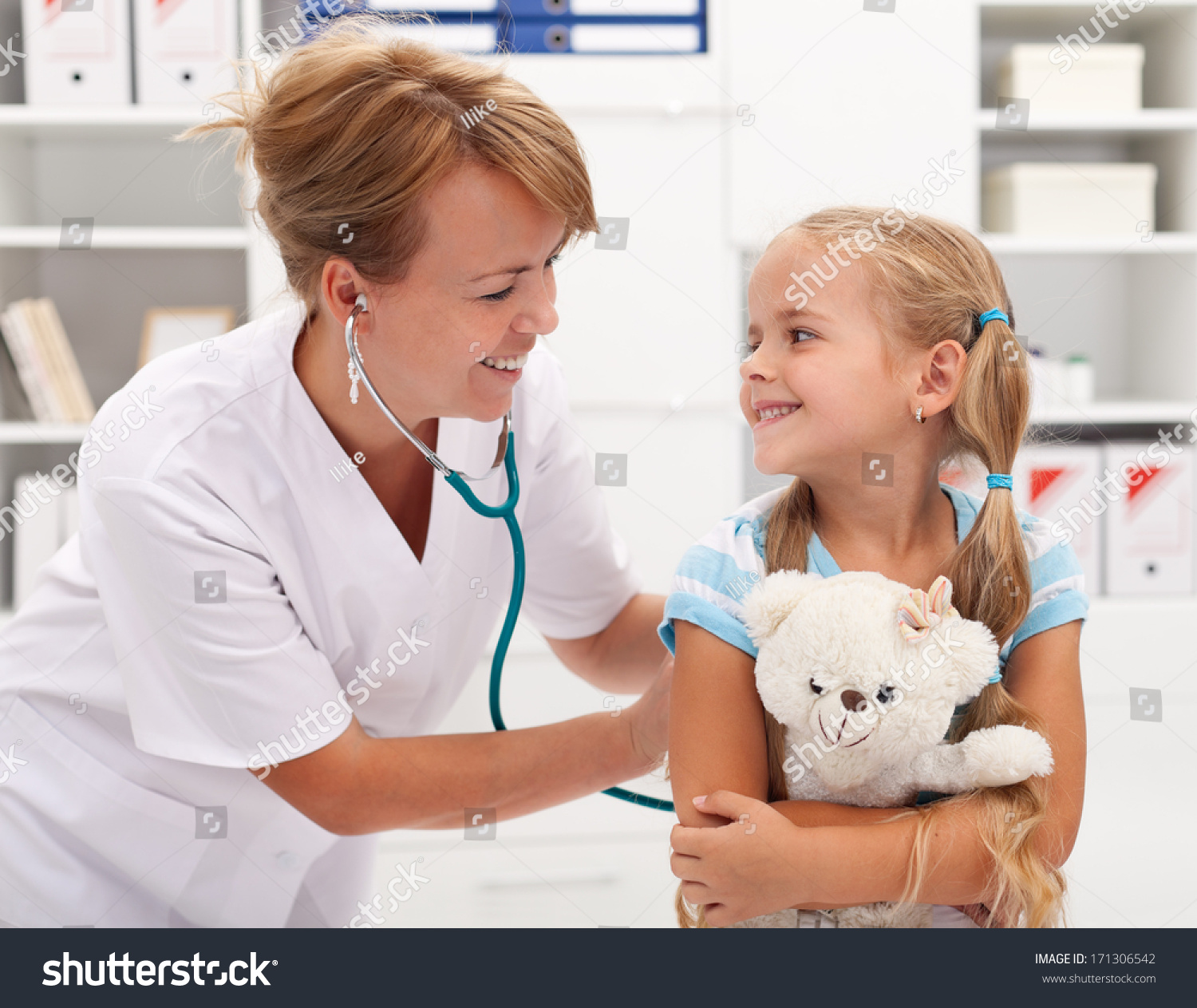 Little Girl At The Doctor For A Checkup Examination Stock 