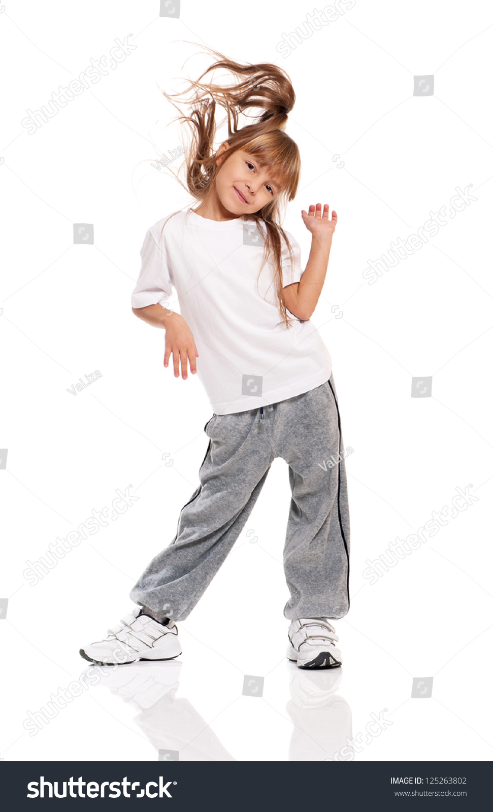 Happy Little Girl Dancing Isolated On Stock Photo 125263802 - Shutterstock