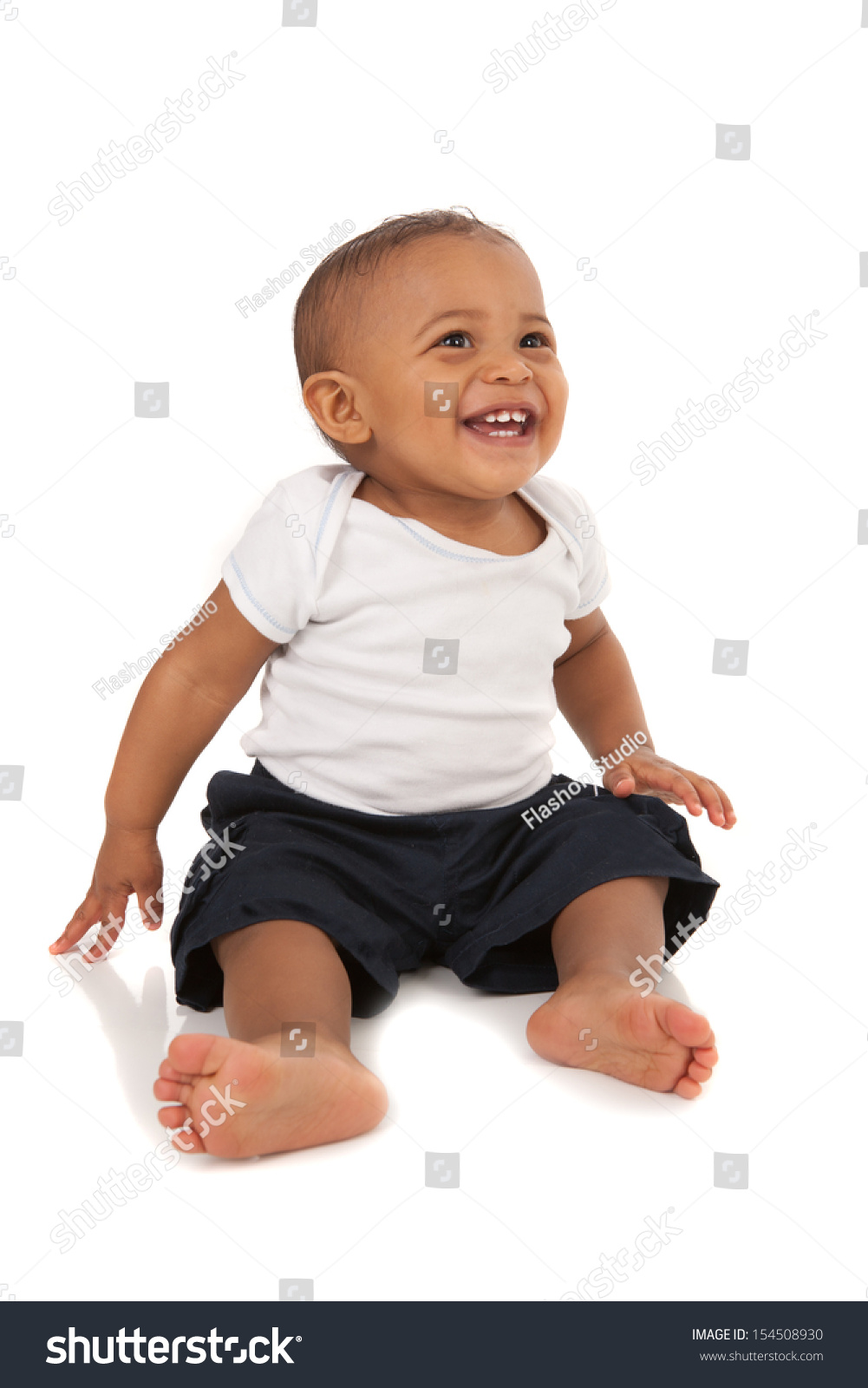 Happy One Year Old African American Baby Boy On Isolated Background