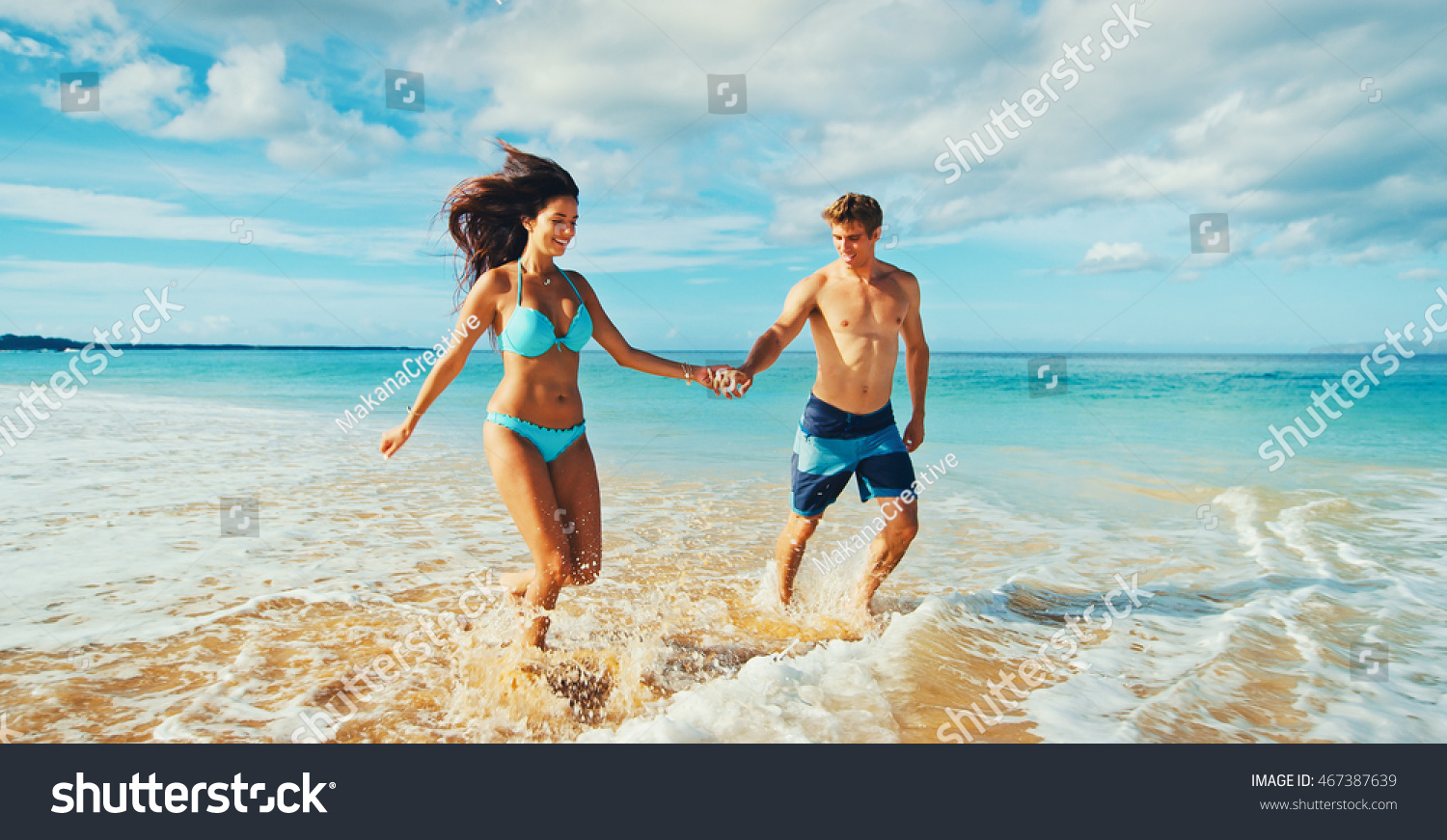 Young couple play on beach Consider, that young couple play on beach