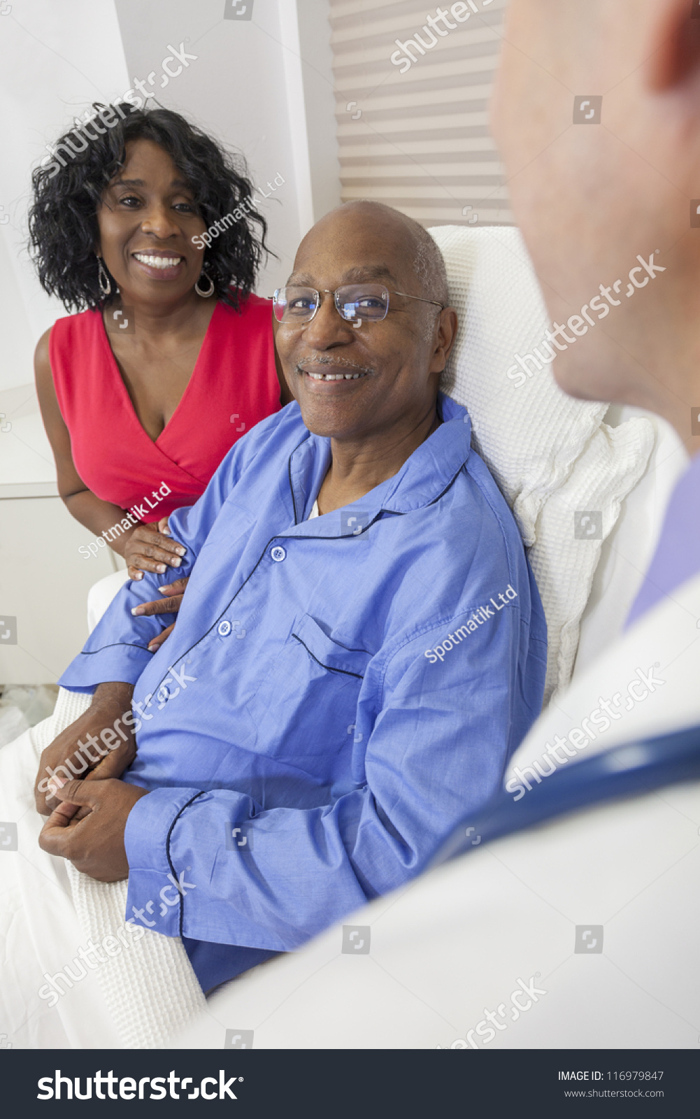 Happy Senior African American Man Patient Recovering In Hospital Bed ...