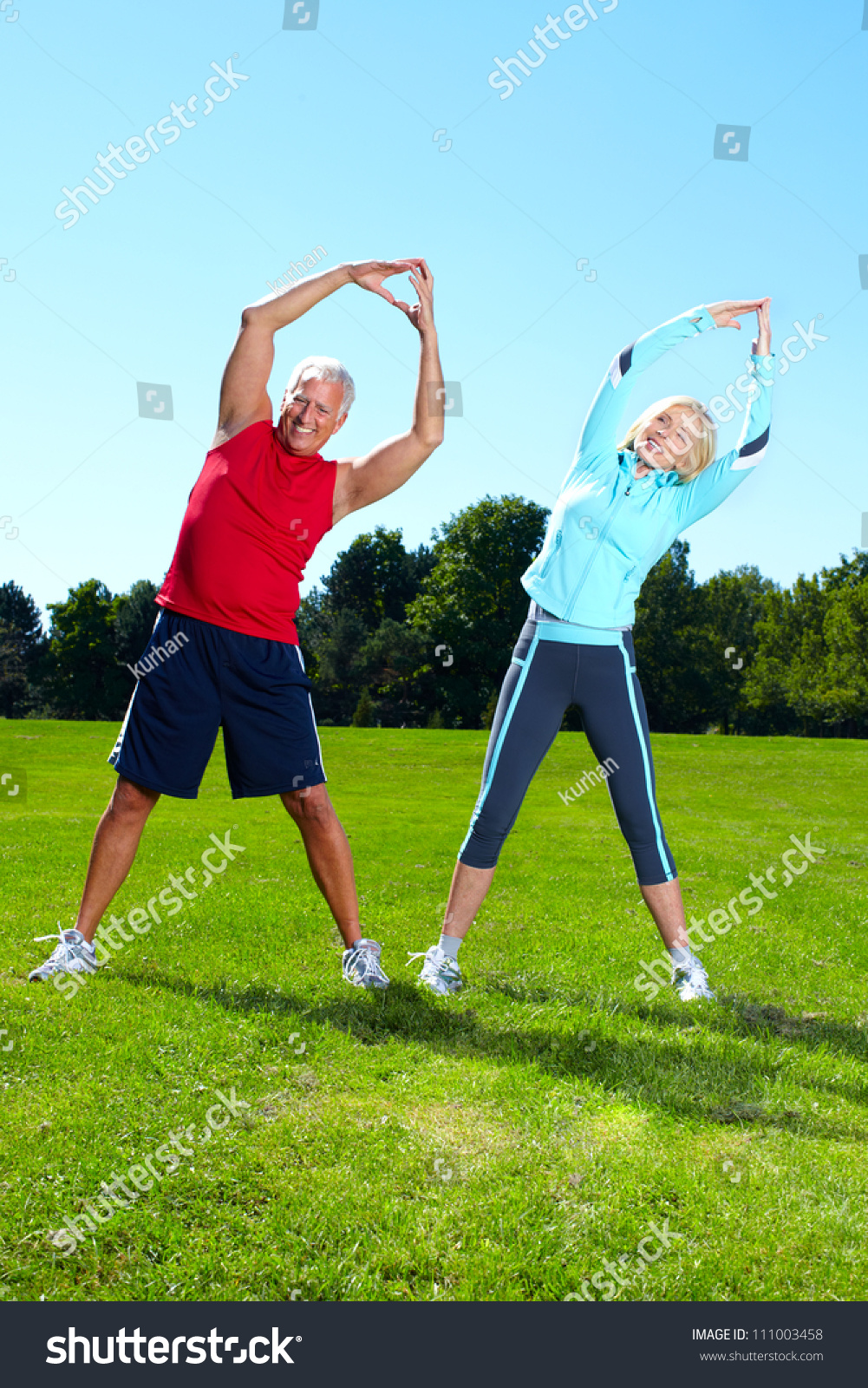 Happy senior fitness couple in the park Happy senior fitness couple in the park