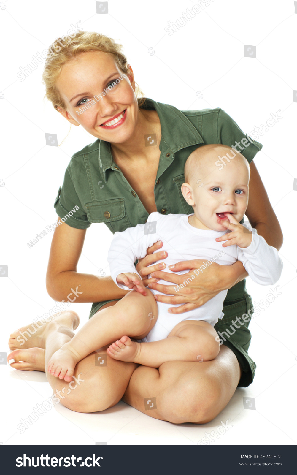Mother Carrying Baby Boy In Sling Outdoors High-Res Stock 