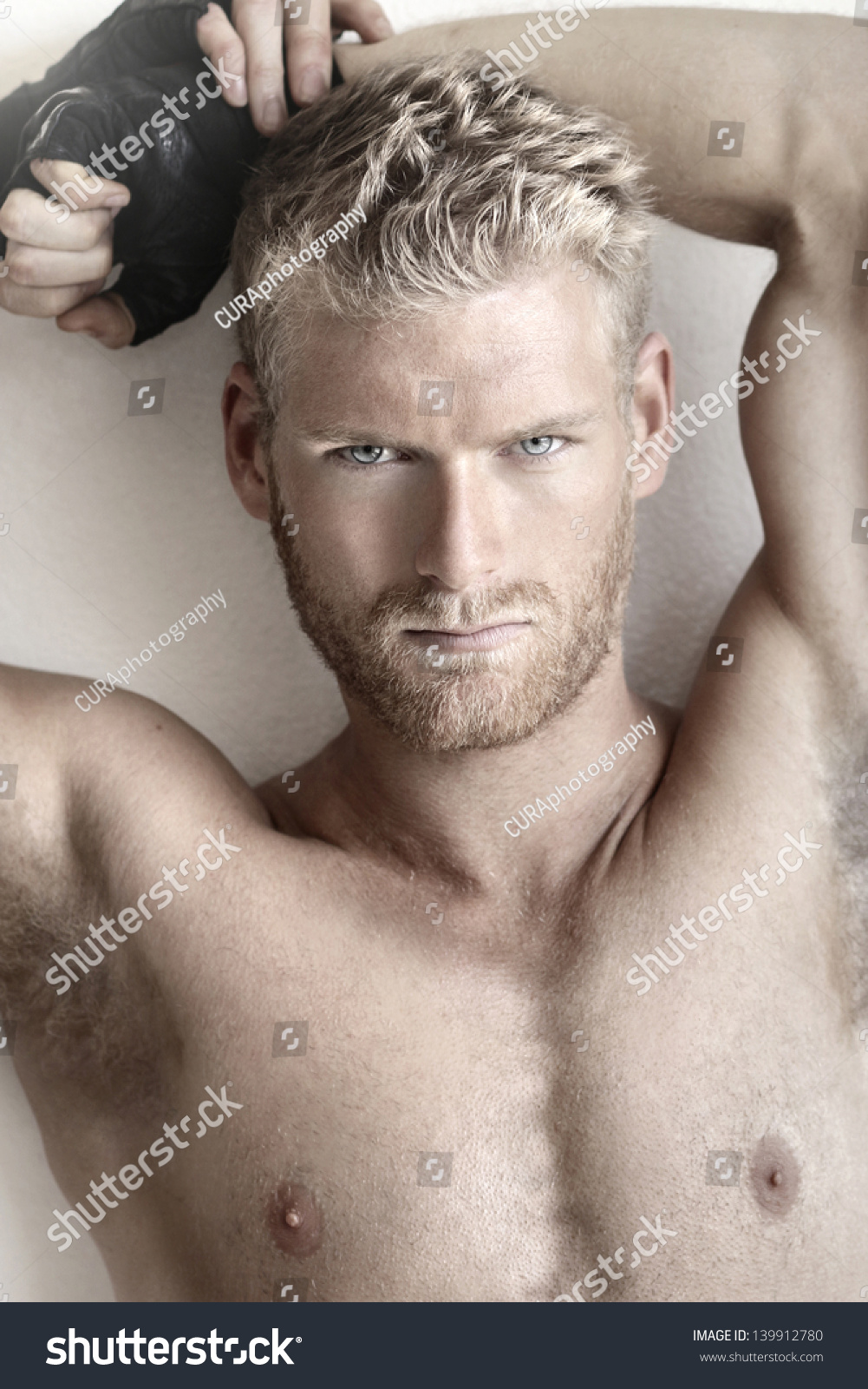 Highly Detailed Fashion Portrait Of A Sexy Muscular Shirtless Male