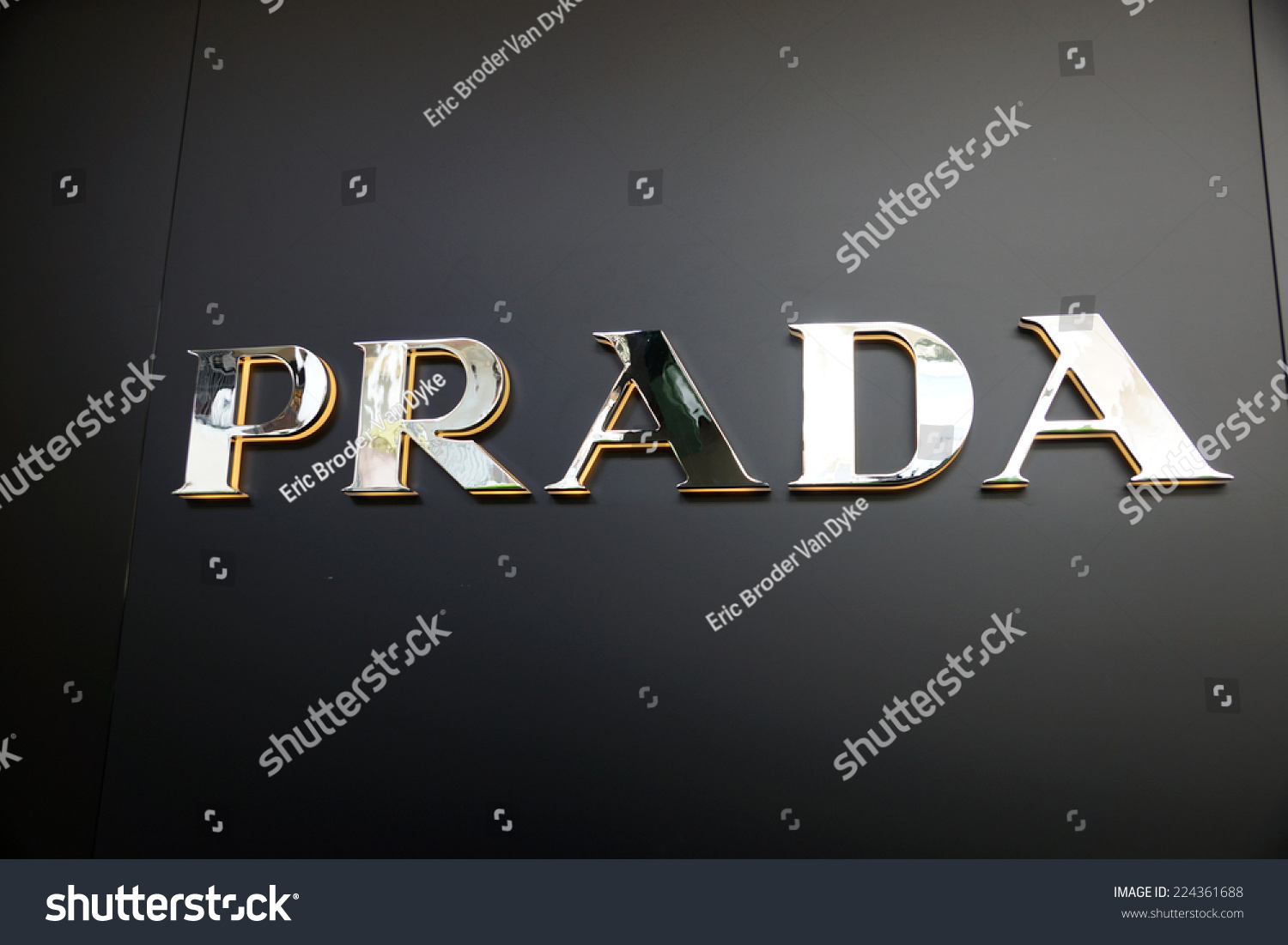 Honolulu - August 7, 2014: : Gold Prada Logo On Black Wall On Their 