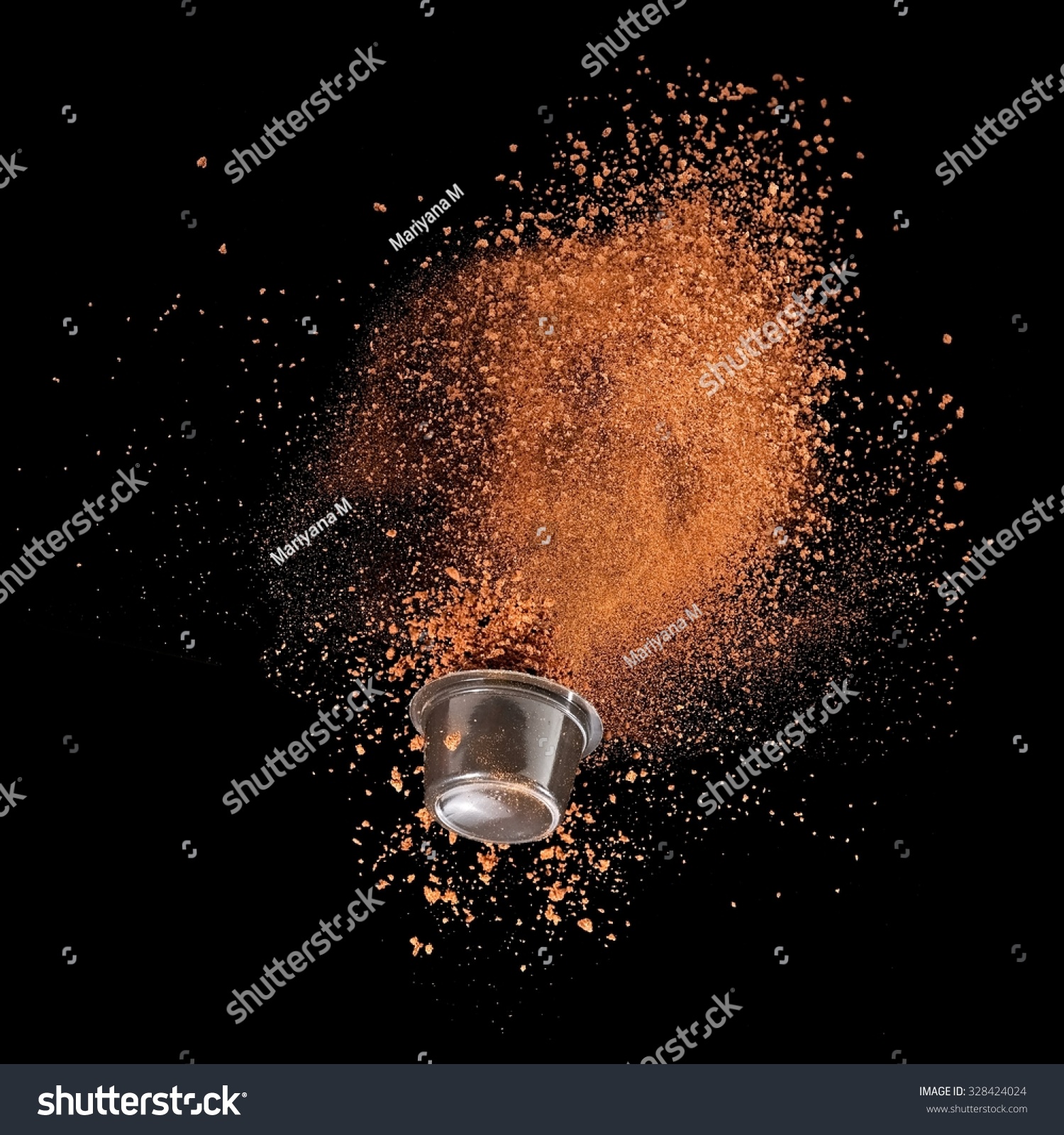 Instant Coffee Explosion From A Capsule Stock Photo 328424024