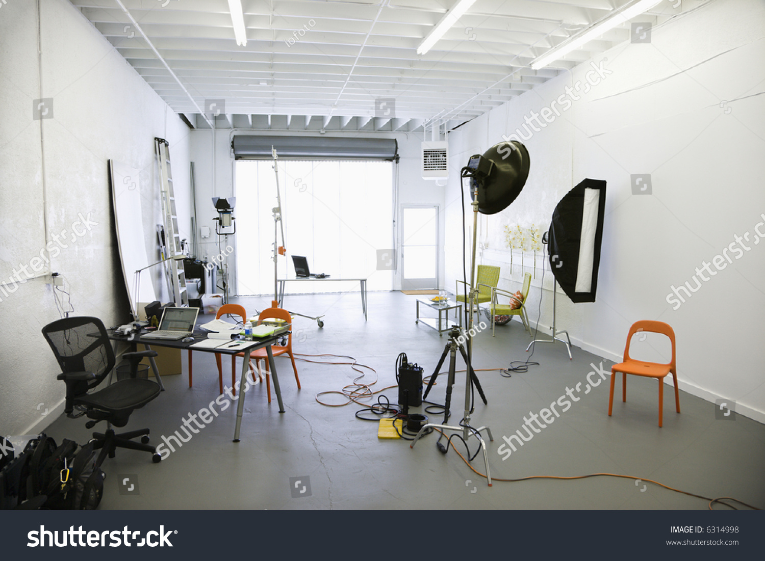 Interior Of Photography Studio With Lights And Various ...
