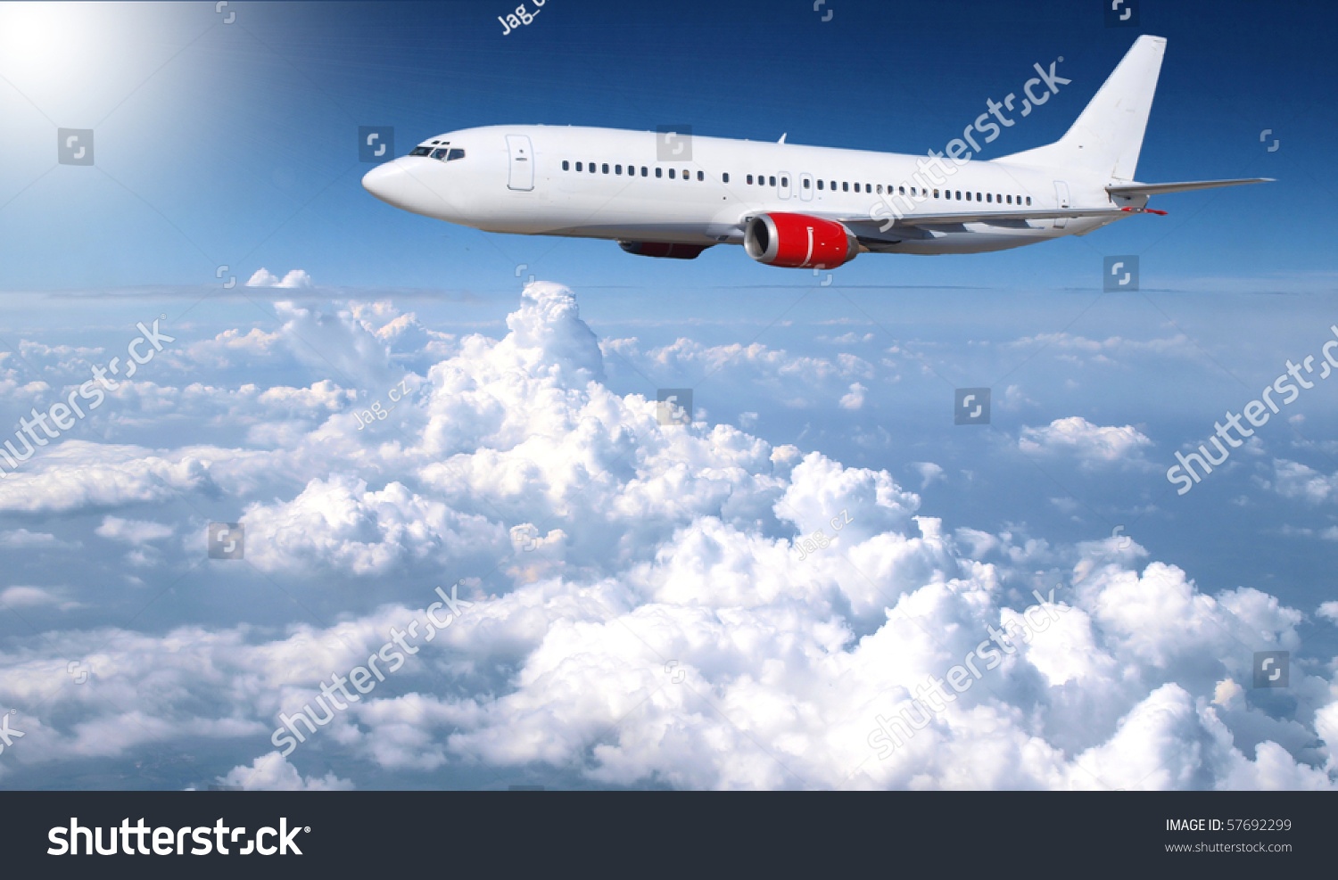 Jet Plane Above Clouds Stock Photo 57692299 : Shutterstock