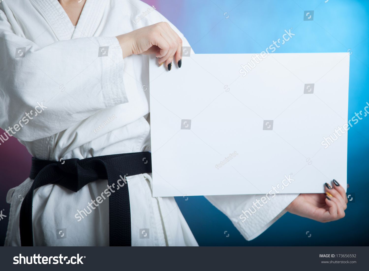 karate girl with black belt posing karate girl with black belt posing