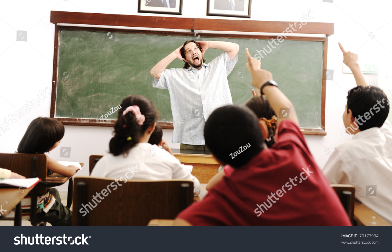 Kids In The School Classroom With A Mad Crazy Silly Teacher Yelling In