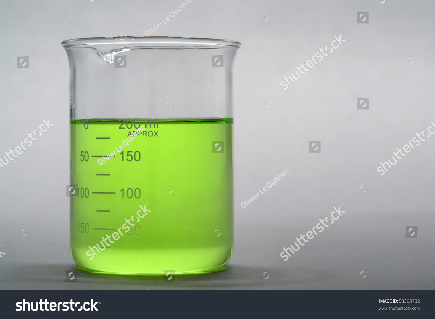 Laboratory Scientific Beaker Filled With Green Liquid For An Experiment